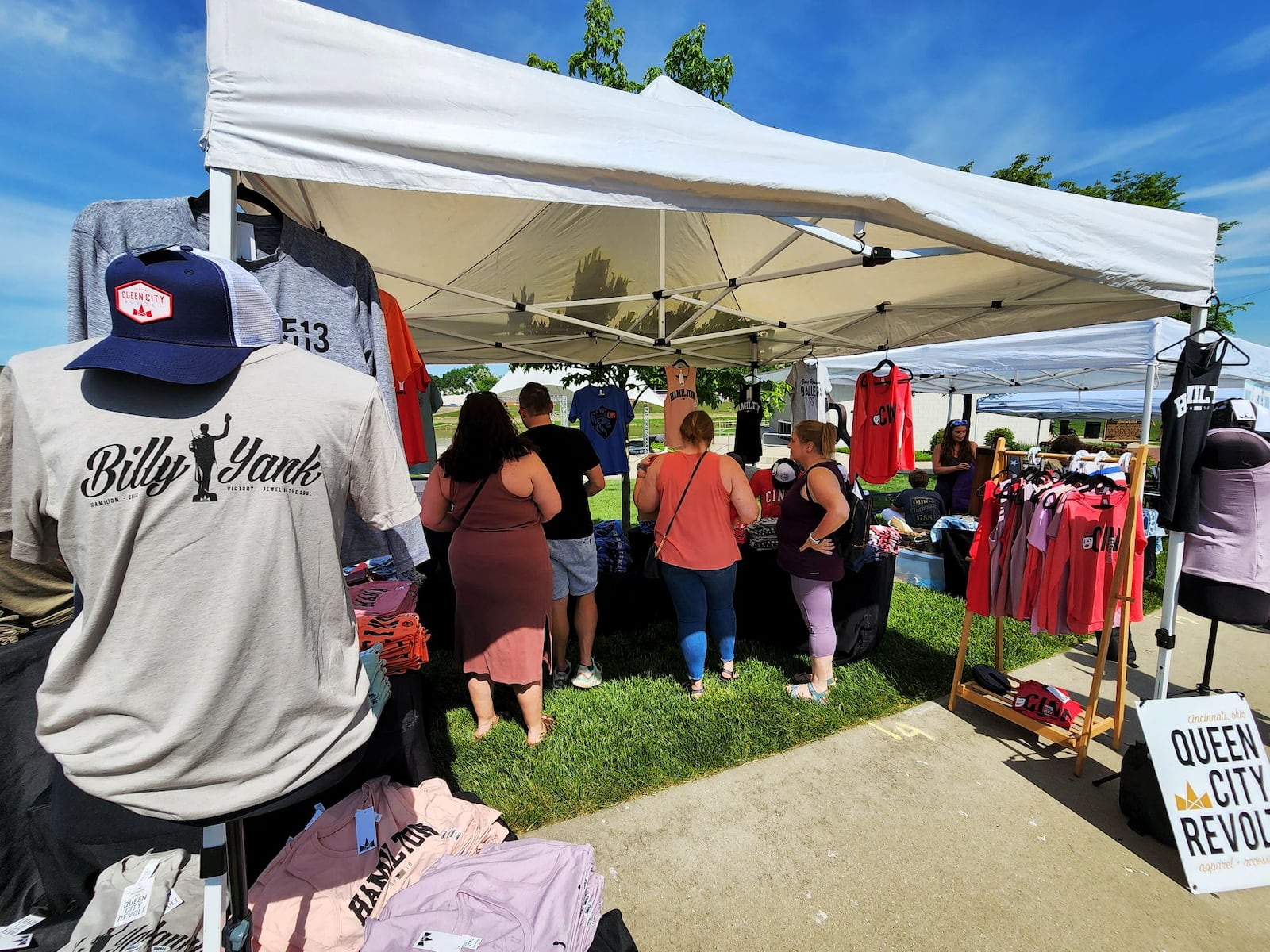 Visitors stroll through Hamilton Flea, a monthly urban artisan market, Saturday, May 14, 2022 at Marcum Park in Hamilton. NICK GRAHAM/STAFF