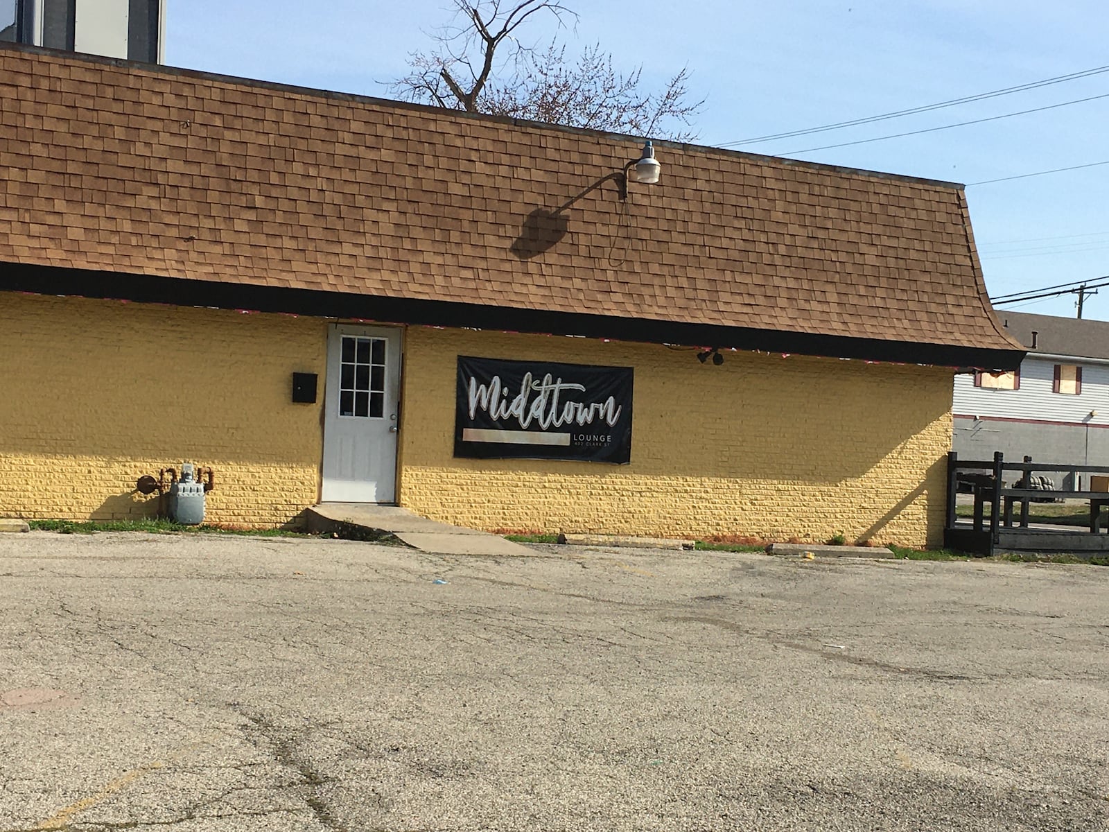 Middletown police have arrested two people for their alleged involvement in a bar shooting Saturday at the Middtown Lounge on Clark Street. LAUREN PACK/STAFF