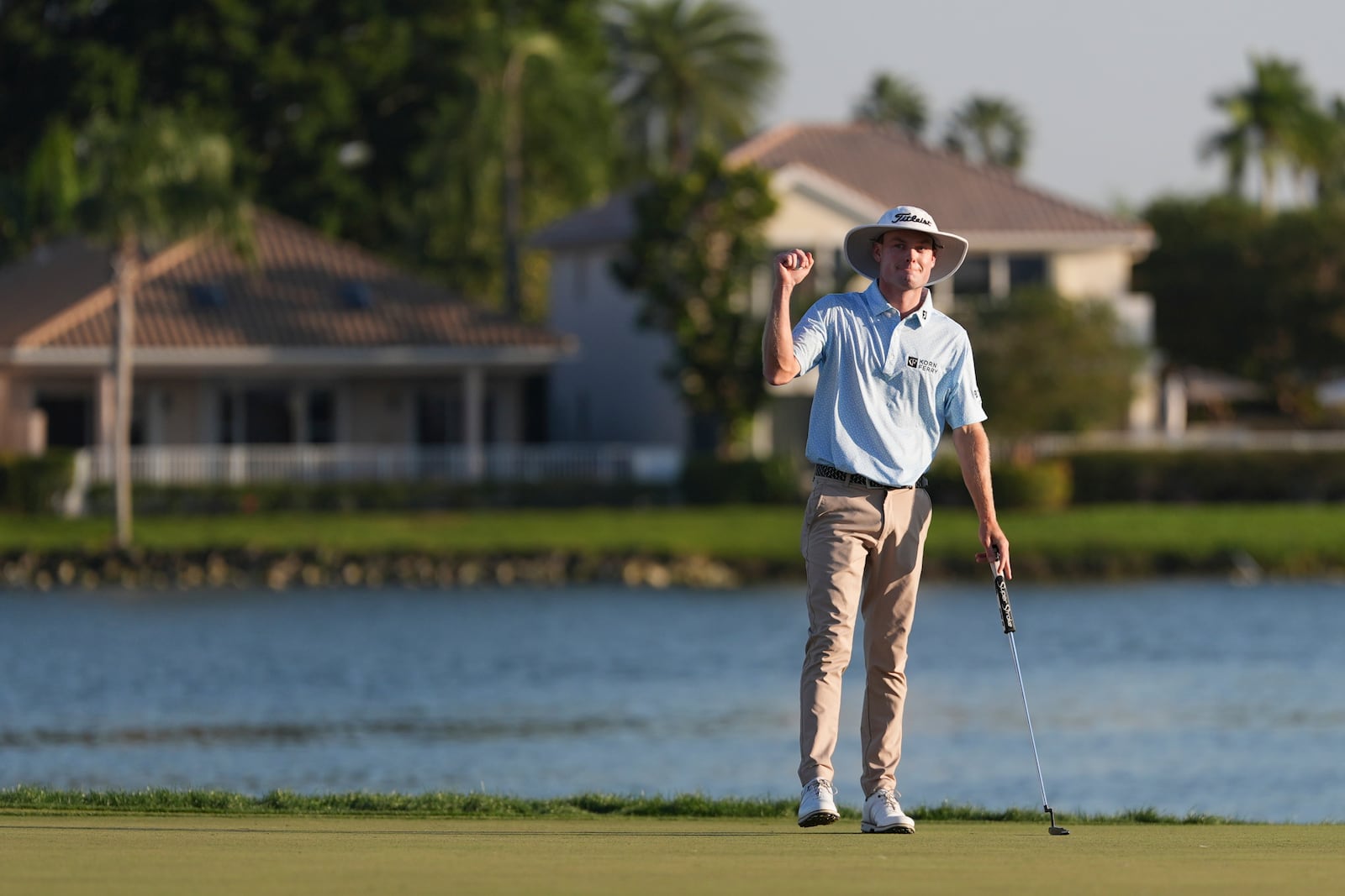 Joe Highsmith pumps his fist after finishing on the 18th green during the final round of the Cognizant Classic golf tournament, Sunday, March 2, 2025, in Palm Beach Gardens, Fla. (AP Photo/Rebecca Blackwell)