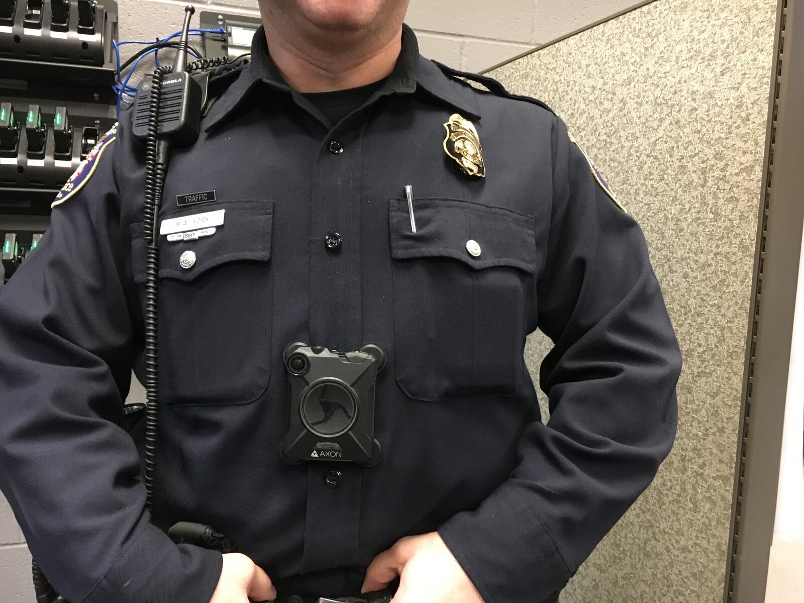 West Chester Twp. Patrol Officer Mark York displays his new body worn camera at the police department.