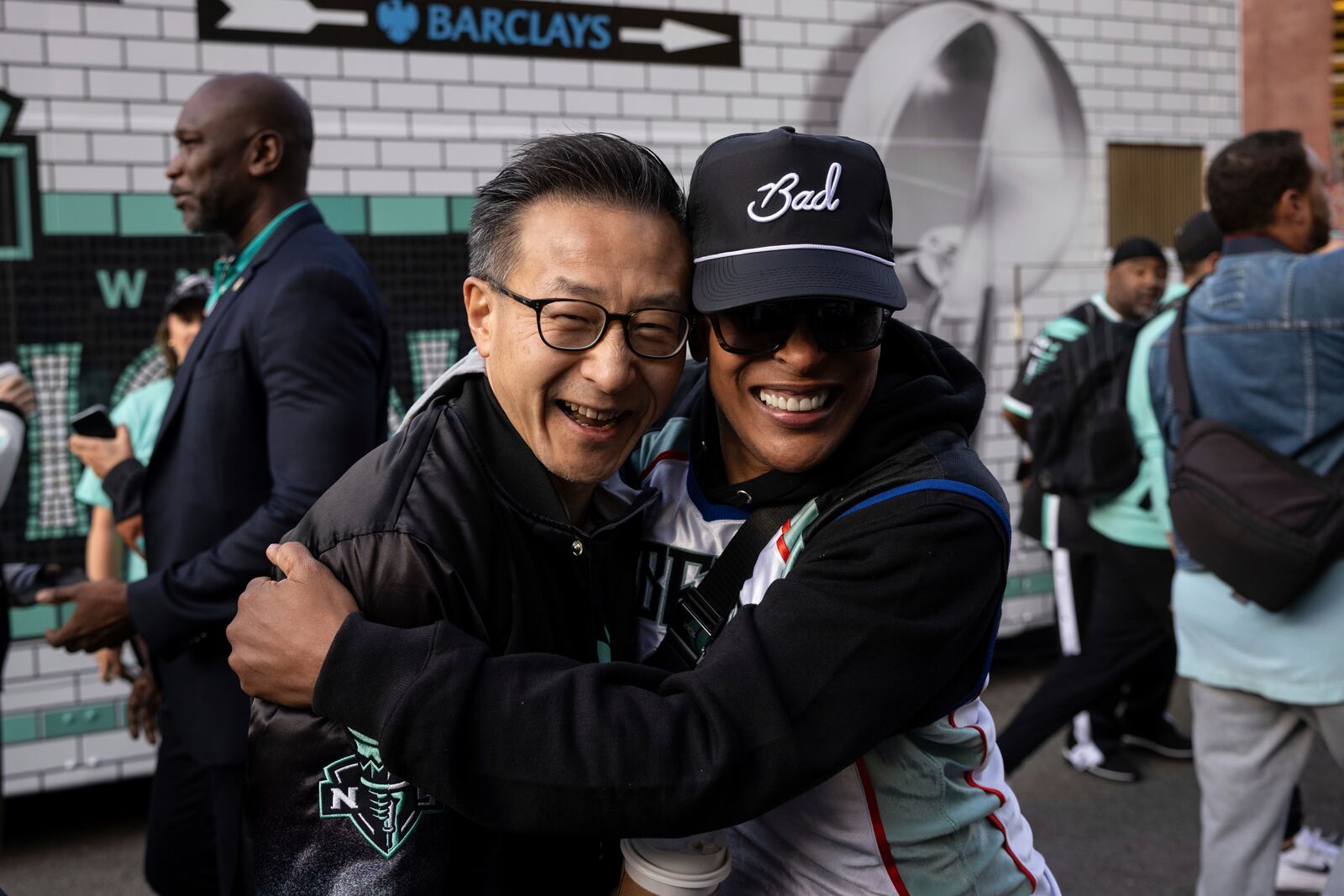 New York Liberty owner Joe Tsai, left, and coach Teresa Weatherspoon embrace before the WNBA basketball championship parade Thursday, Oct. 24, 2024, in New York. (AP Photo/Yuki Iwamura)