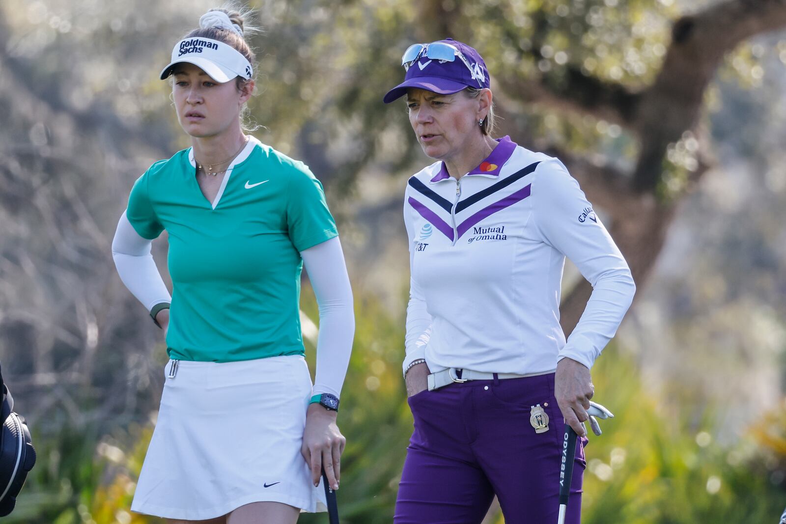 Nelly Korda, left, and Annika Sorenstam, right, talk on the eighth hole during the first round of the Hilton Grand Vacations Tournament of Champions LPGA golf tournament in Orlando, Fla., Thursday, Jan. 30, 2025. (AP Photo/Kevin Kolczynski)