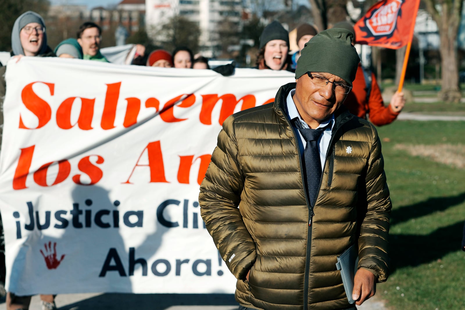 Peruvian farmer Luciano Lliuya arrives at the Higher Regional Court in Hamm, Germany, for a first hearing of his climate damages case against the German energy company RWE for its carbon emissions, which may have been contributing to the melting of a nearby glacier that could flood his home, Monday, March 17, 2025. (AP Photo/Martin Meissner)