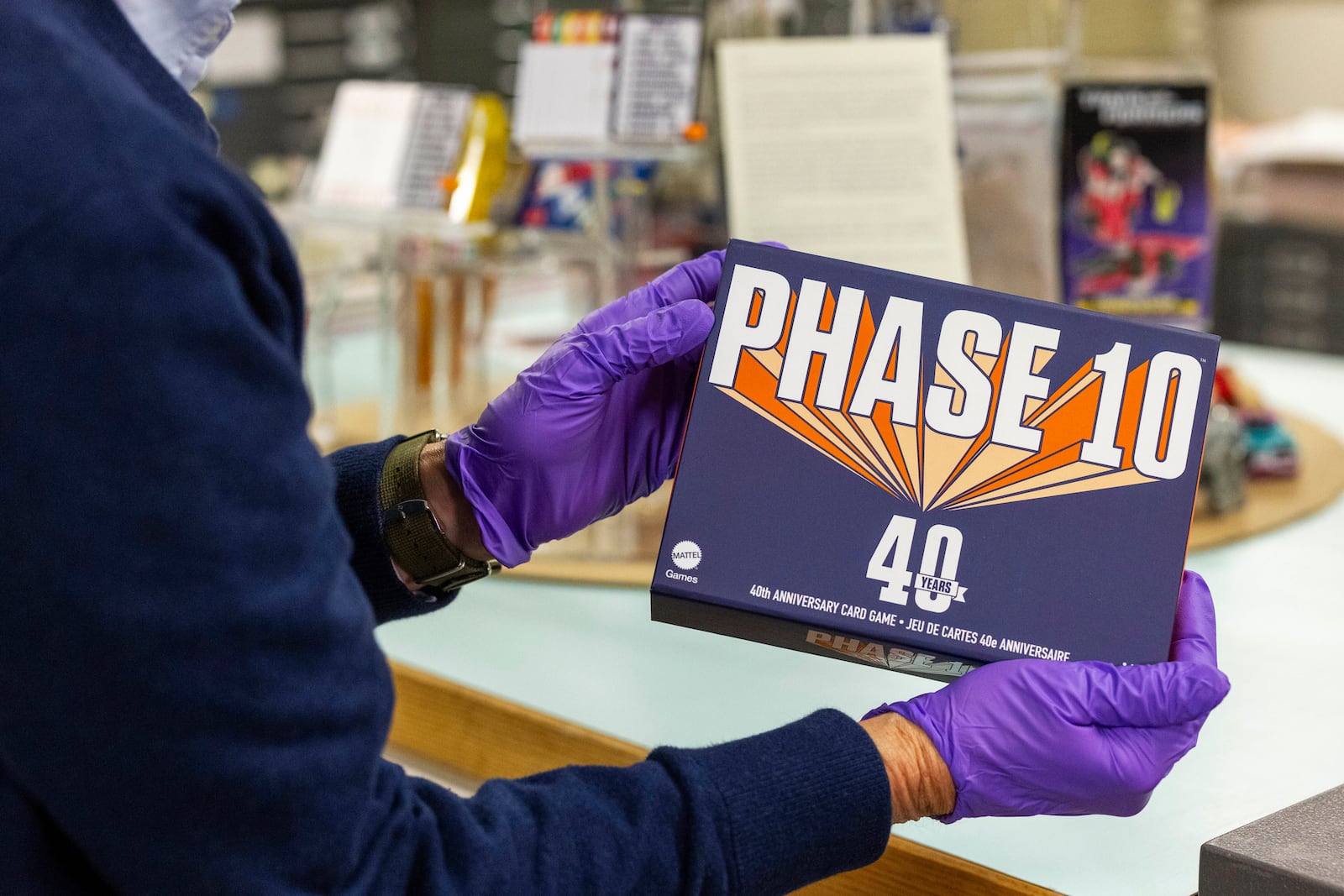 Christopher Bensch, chief curator at The Strong National Museum of Play, holds one of the games that is a finalist for the 2024 Toy Hall of Fame, Tuesday, Oct. 15, 2024, in Rochester, N.Y. (AP Photo/Lauren Petracca)