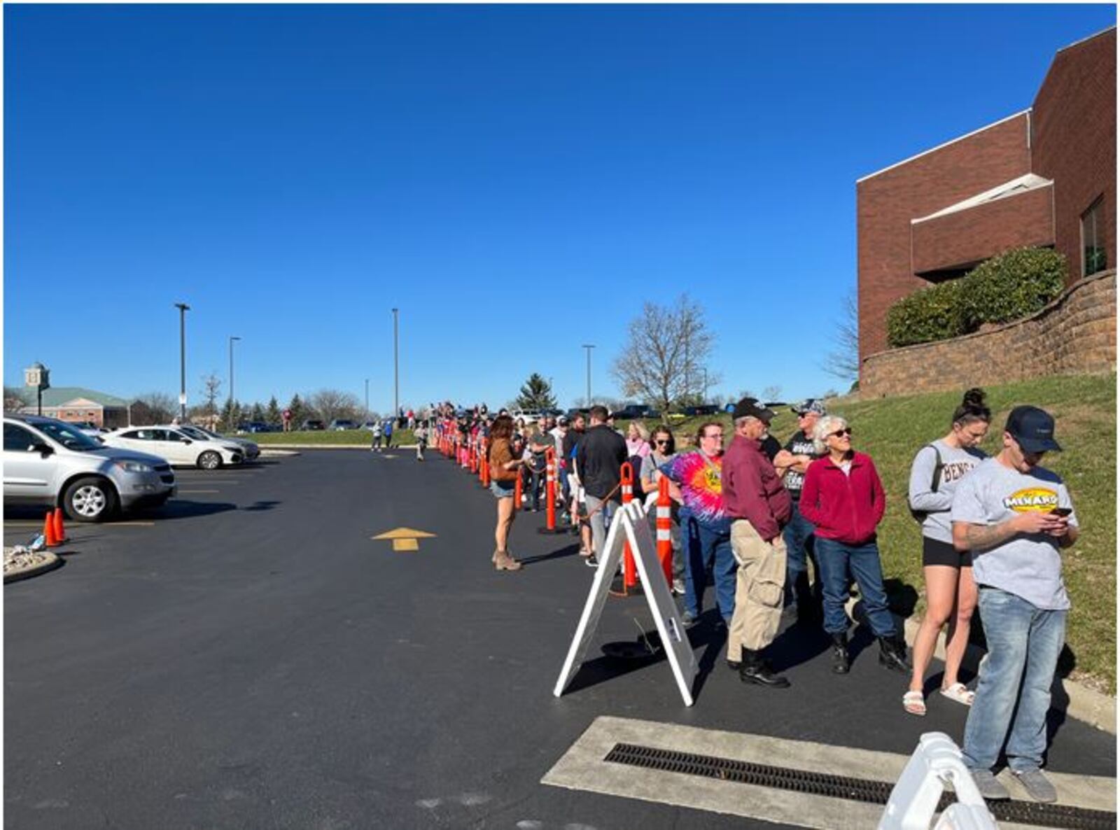 Warren County residents enjoyed a beautiful and sunny fall day as they stood in line waiting to cast an early vote at the Warren County Board of Elections. ED RICHTER/STAFF