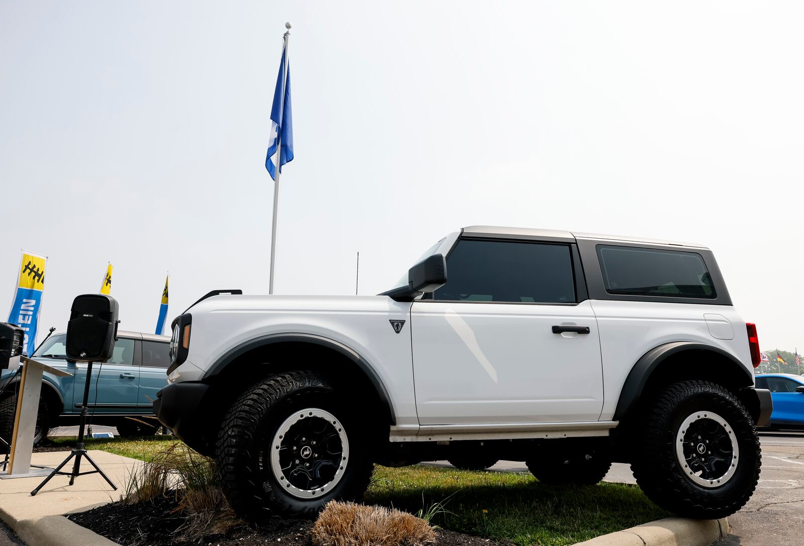 Employees and leaders gathered at Hamilton’s thyssenkrupp BILSTEIN Wednesday, June 28, 2023 for a flag ceremony to celebrate receiving Ford Q1 Certification.
Each year, Ford Motor Company awards roughly 100 of its more than 1,400 Tier 1 production suppliers with Q1 certification. This year, Hamilton’s thyssenkrupp BILSTEIN was among the recipients. Three BILSTEIN equipped Ford Broncos were the backdrop for the ceremony. NICK GRAHAM/STAFF