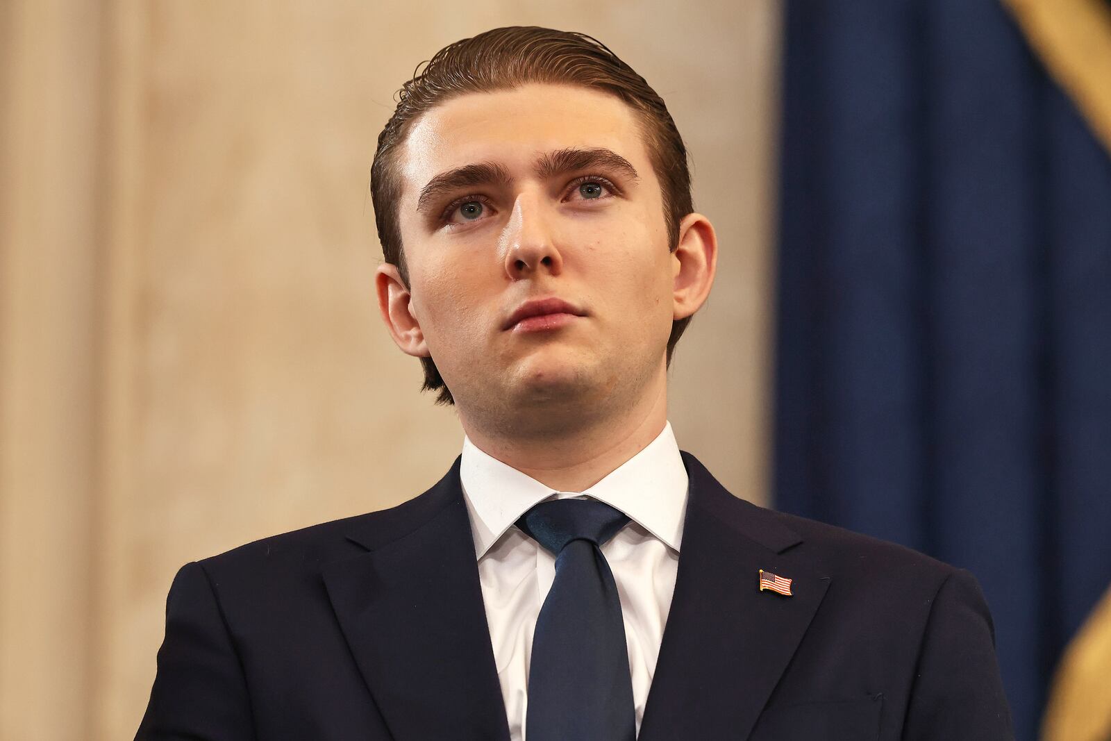 Barron Trump arrives before the 60th Presidential Inauguration in the Rotunda of the U.S. Capitol in Washington, Monday, Jan. 20, 2025. (Chip Somodevilla/Pool Photo via AP)