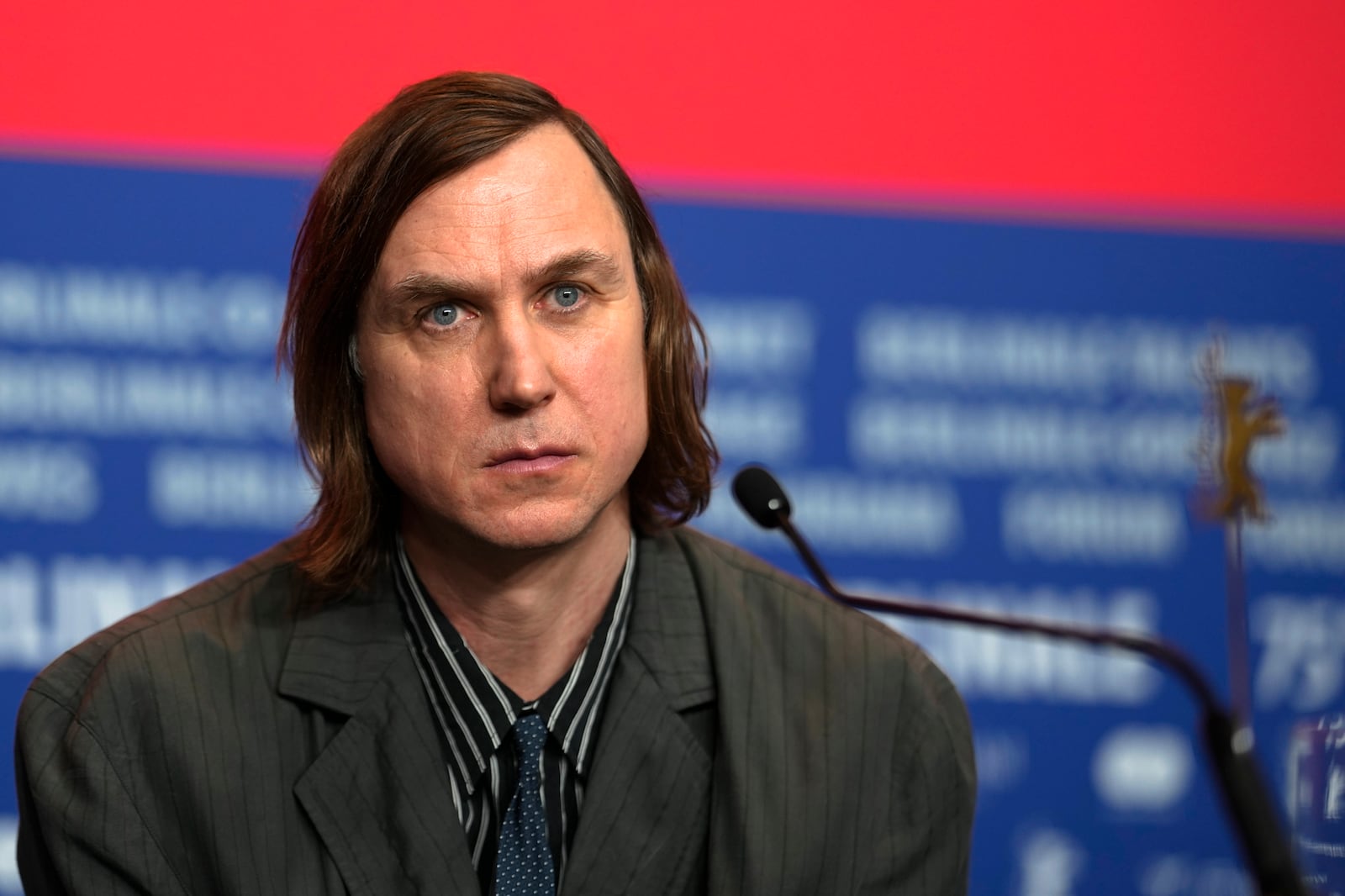 Lars Eidinger attends a news conference for the film 'Das Licht' at the International Film Festival, Berlinale, in Berlin, Thursday, Feb. 13, 2025. (AP Photo/Markus Schreiber)