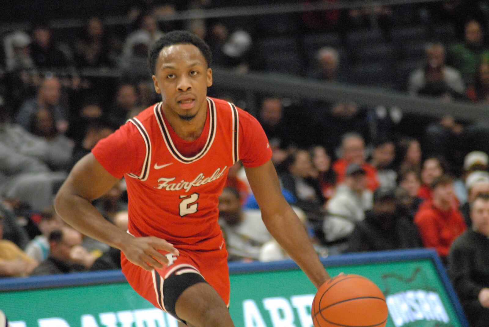 Fairfield senior Deshawne Crim (2) dribbles the ball up court against Wayne during a Division I district final on Saturday night at UD Arena. The Indians won 76-51. Chris Vogt/CONTRIBUTED