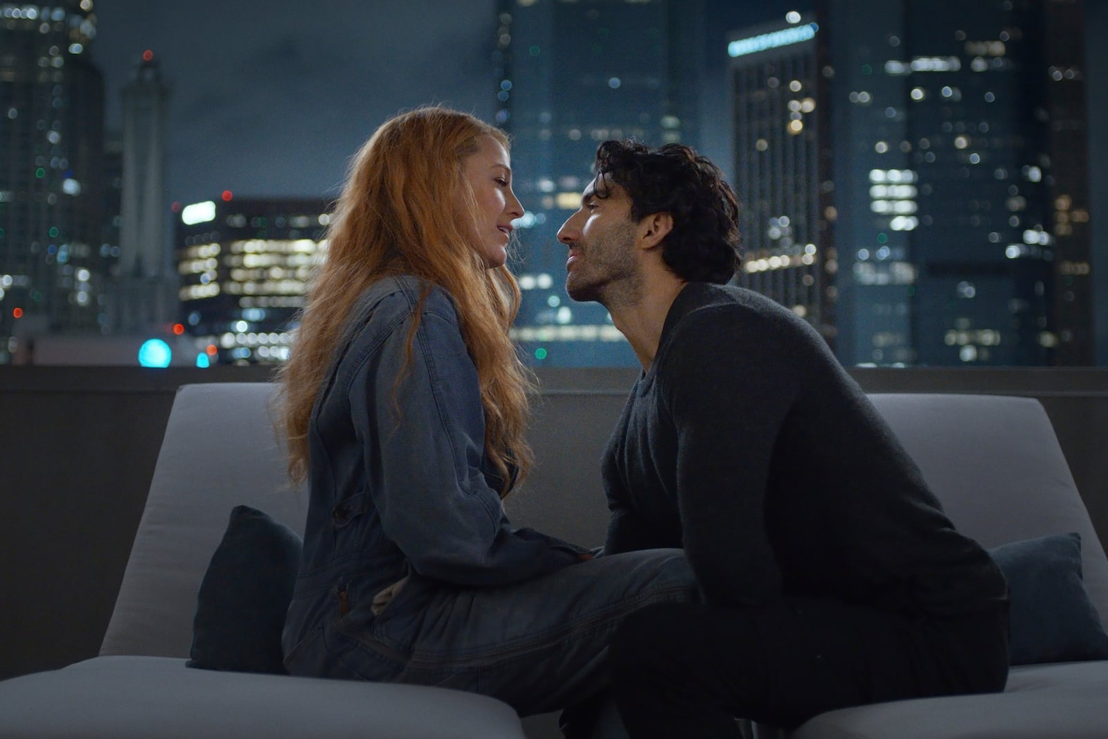 This image released by Sony Pictures shows Justin Baldoni, right, and Blake Lively in a scene from "It Ends With Us." (Nicole Rivelli/Sony Pictures via AP)