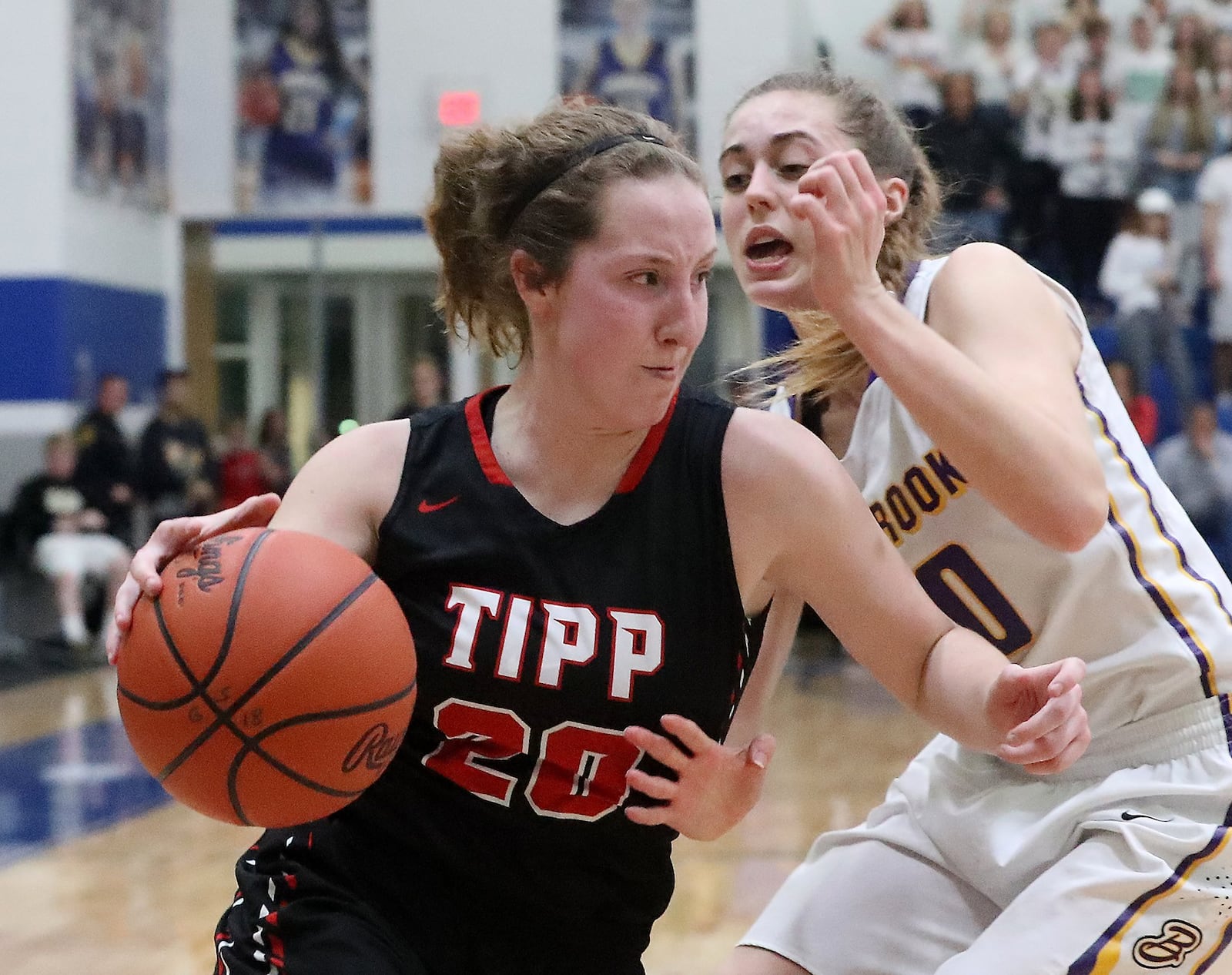 Tippecanoe’s Claire Hinkle drives around Bellbrook’s Kayla Paul during a Division II regional final March 9, 2018, at Springfield. Bellbrook won 47-41. BILL LACKEY/STAFF