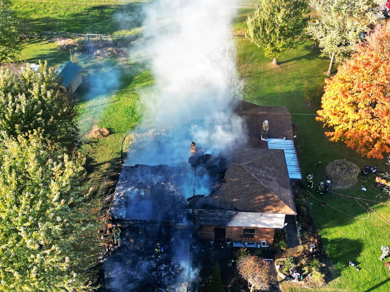 Fire crews from multiple departments in Butler and Preble counties responded to a house fire on Waynes Trace Road in Preble County Tuesday, Oct. 22, 2024. NICK GRAHAM/STAFF