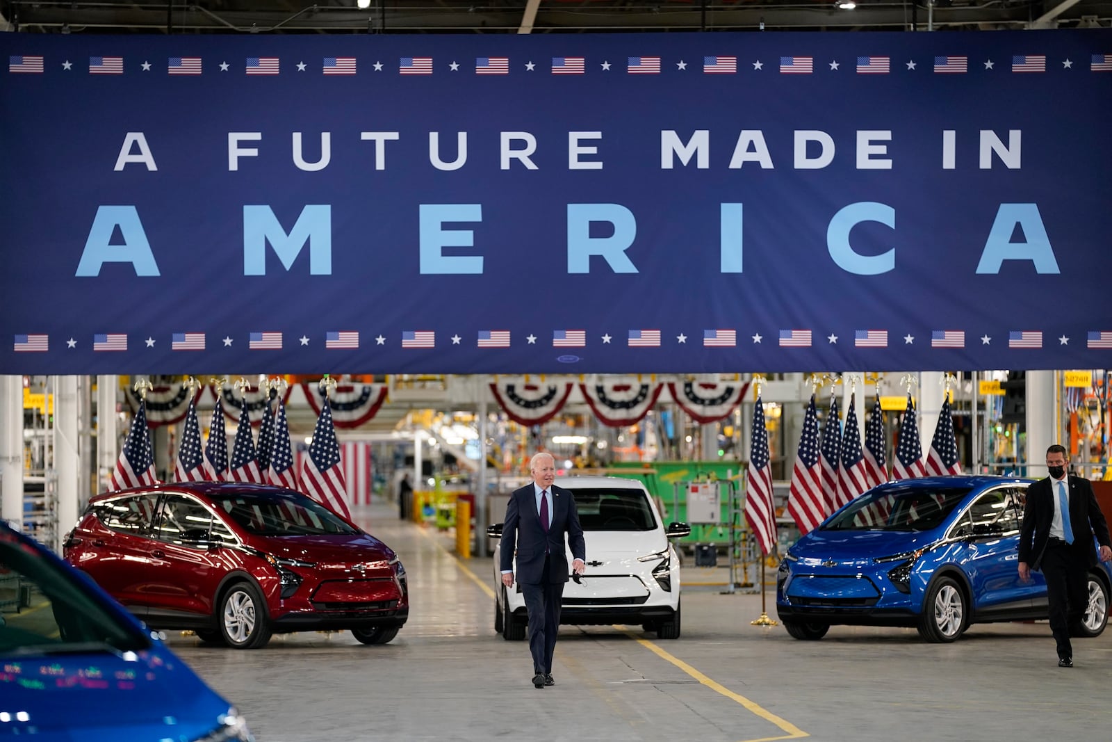 FILE - President Joe Biden arrives to speak during a visit to the General Motors Factory ZERO electric vehicle assembly plant, Nov. 17, 2021, in Detroit. (AP Photo/Evan Vucci, File)