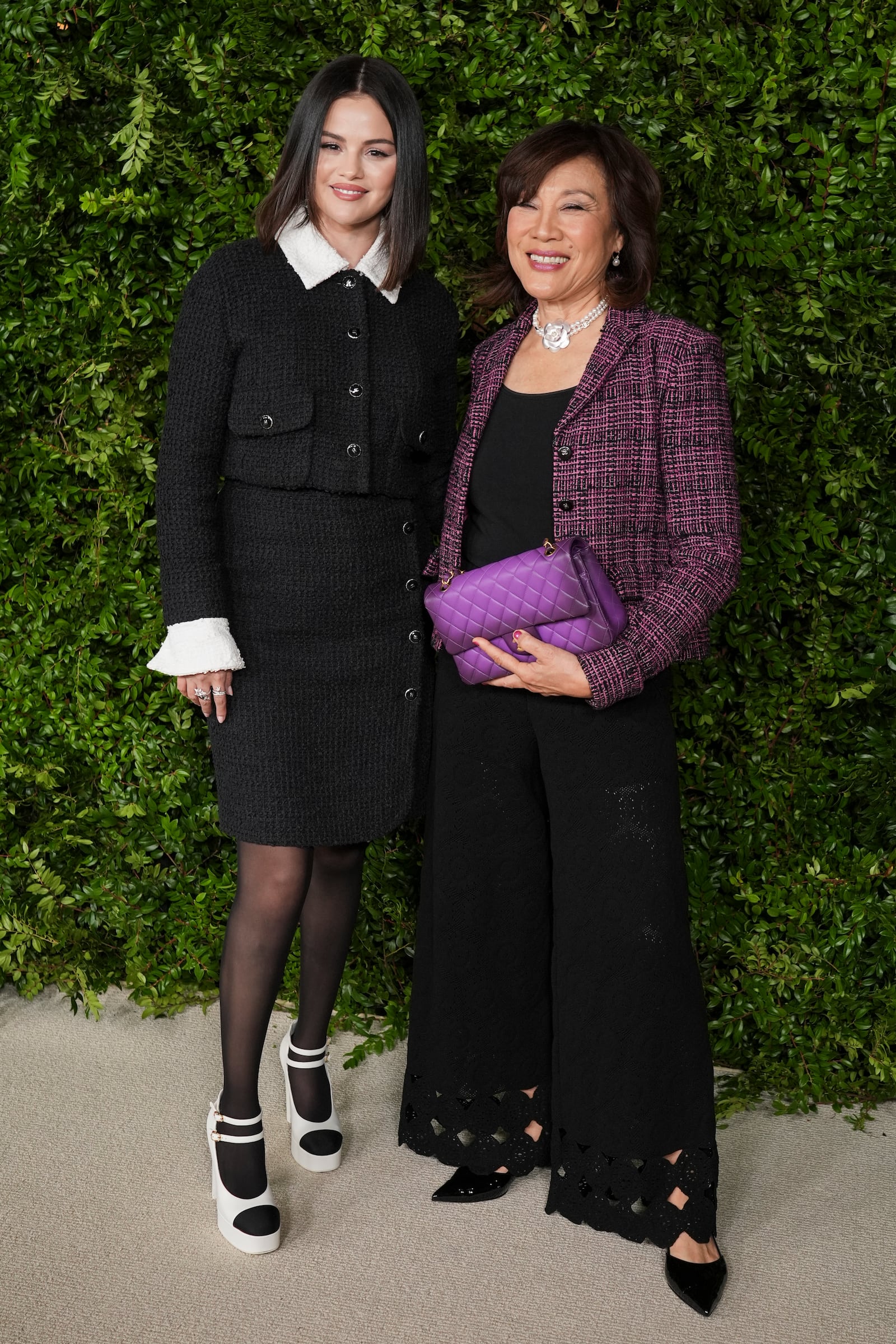 Selena Gomez, left, and Janet Yang attend the Academy Women's Luncheon on Tuesday, Dec. 10, 2024, at the Academy Museum of Motion Pictures in Los Angeles. (AP Photo/Chris Pizzello)