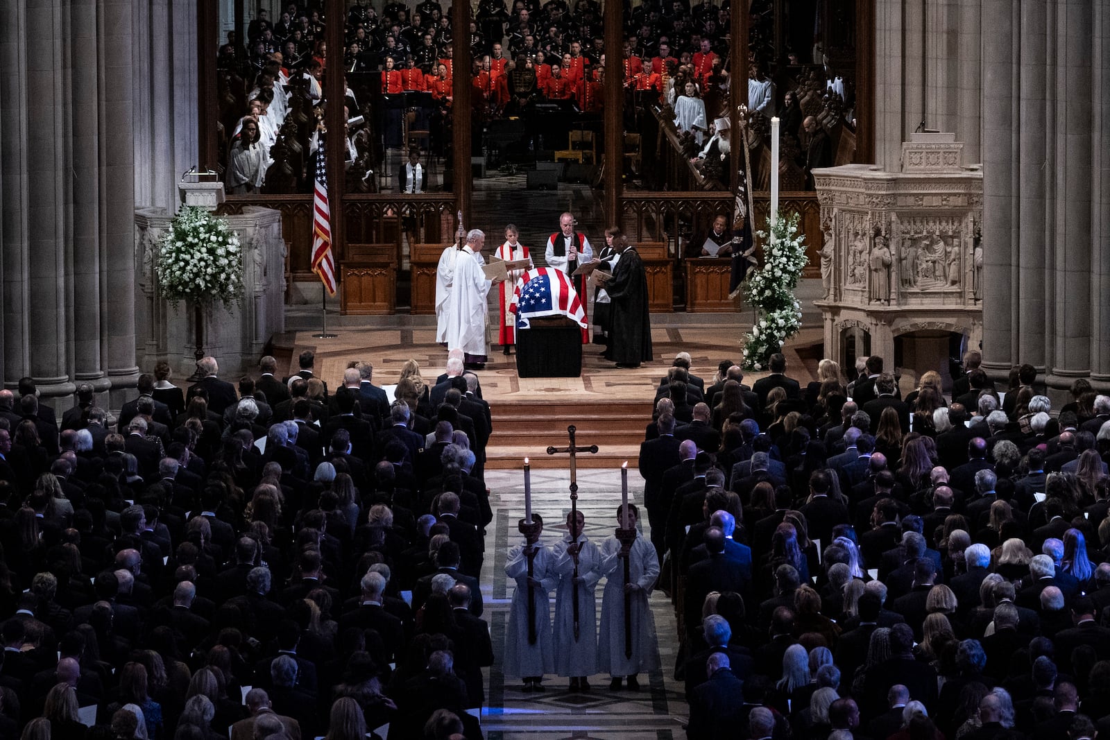 The flag-draped casket of former President Jimmy Carter is pictured before being carried out following a state funeral at the National Cathedral, Thursday, Jan. 9, 2025, in Washington. (Haiyun Jiang/The New York Times via AP, Pool)