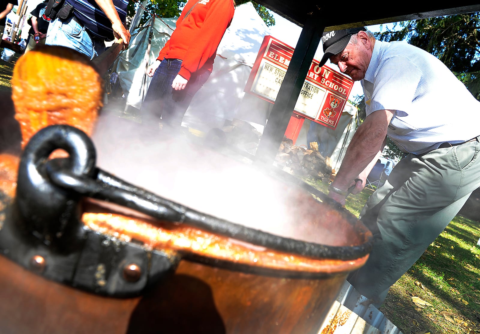 A bubbling cauldron of apple butter.