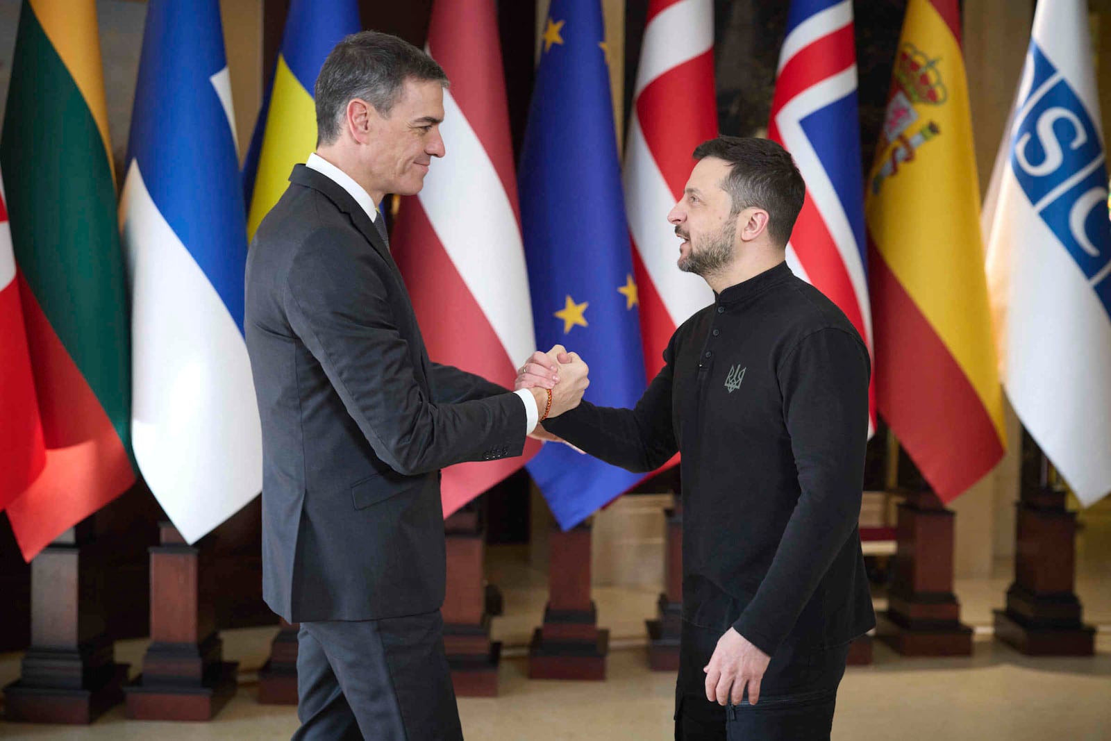 In this photo provided by the Ukrainian Presidential Press Office, Office shows Ukraine's President Volodymyr Zelensky, right, Spain's Prime Minister Pedro Sanchez in Kyiv, Ukraine, Monday, Feb. 24, 2025. (Ukrainian Presidential Press Office via AP)