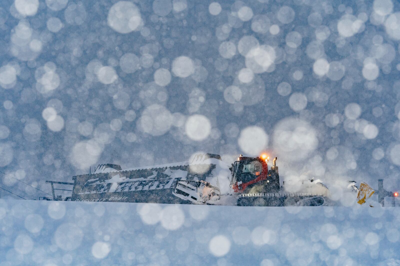 Snow is plowed during a storm at the Mammoth Mountain Ski Area Thursday, Feb. 13, 2025, in Mammoth Lakes, Calif. (Cody Mathison/Mammoth Mountain via AP)