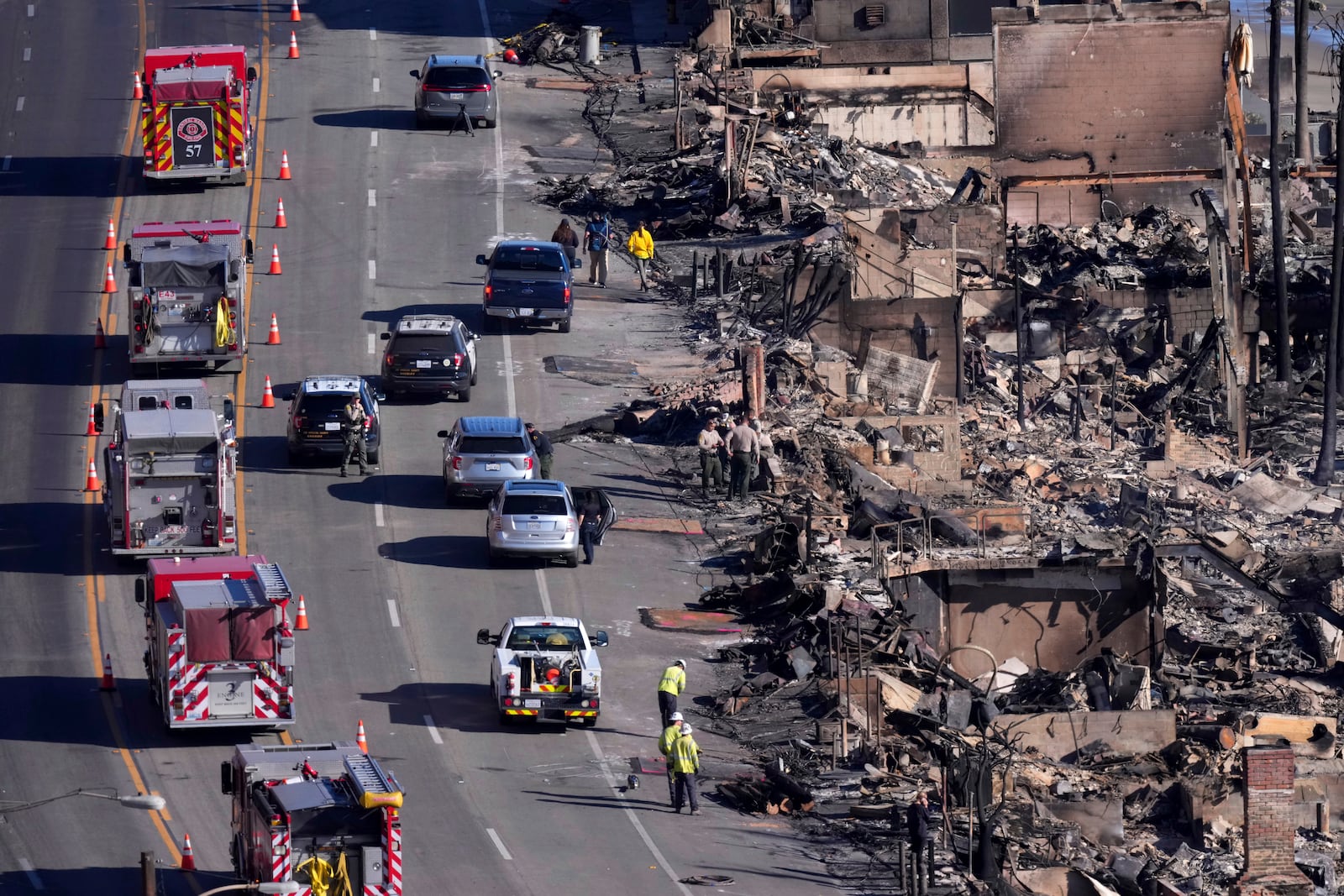 Homes along Pacific Coast Highway are seen burned by the Palisades Fire, Sunday, Jan. 12, 2025, in Malibu, Calif. (AP Photo/Mark J. Terrill)