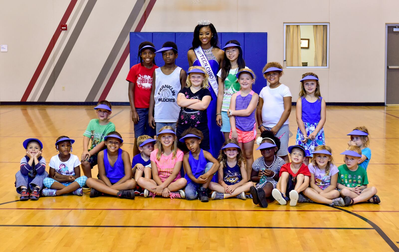 Au’Lauren Million spoke with children July 13 at a day camp at Atrium Family YMCA about the importance of being a buddy instead of a bully. NICK GRAHAM/STAFF