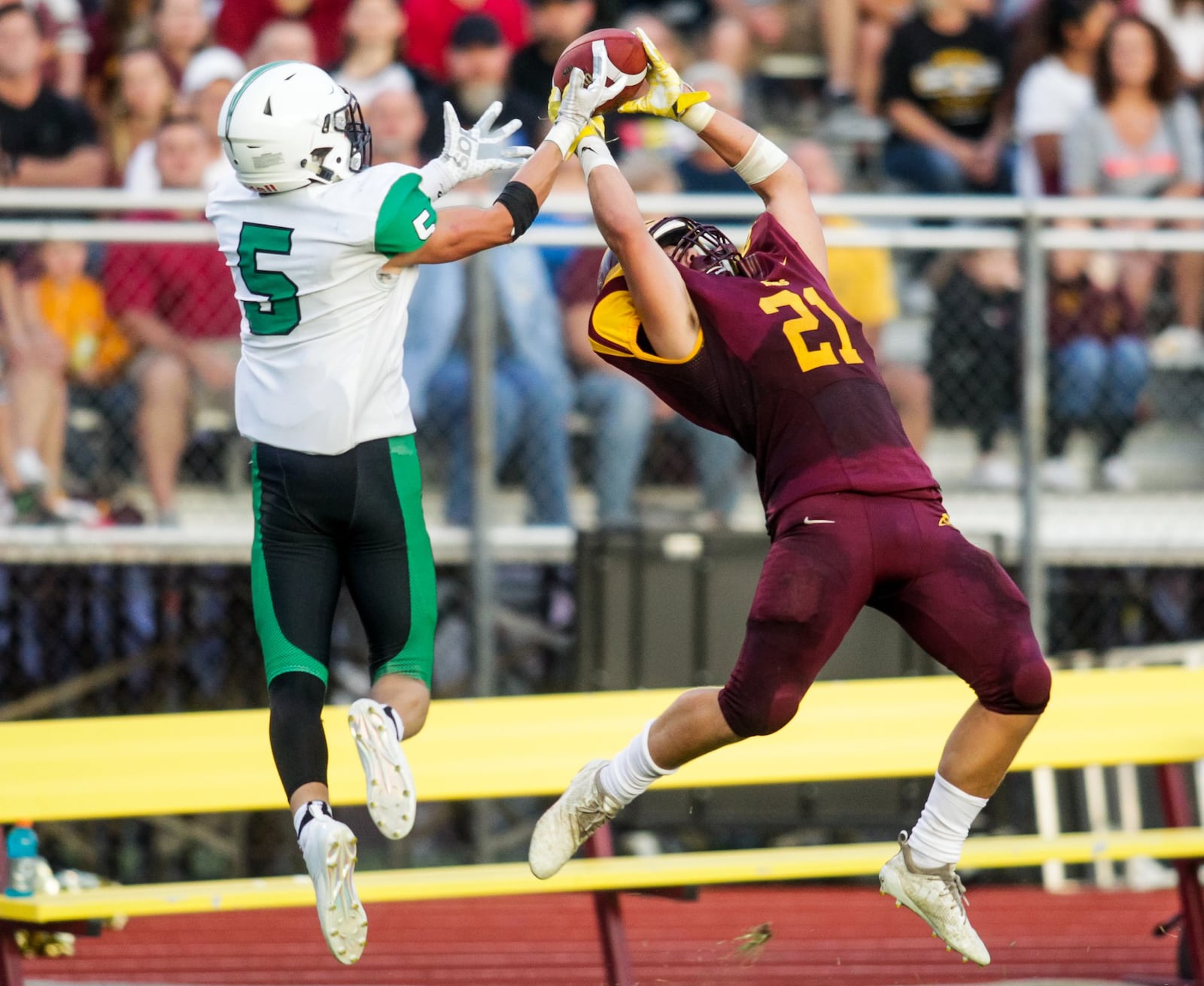 Badin’s Marshall Flaig (5) breaks up a pass intended for Jackson Gifford (21) of Ross during Friday night’s game at Robinson Field in Ross Township. NICK GRAHAM/STAFF