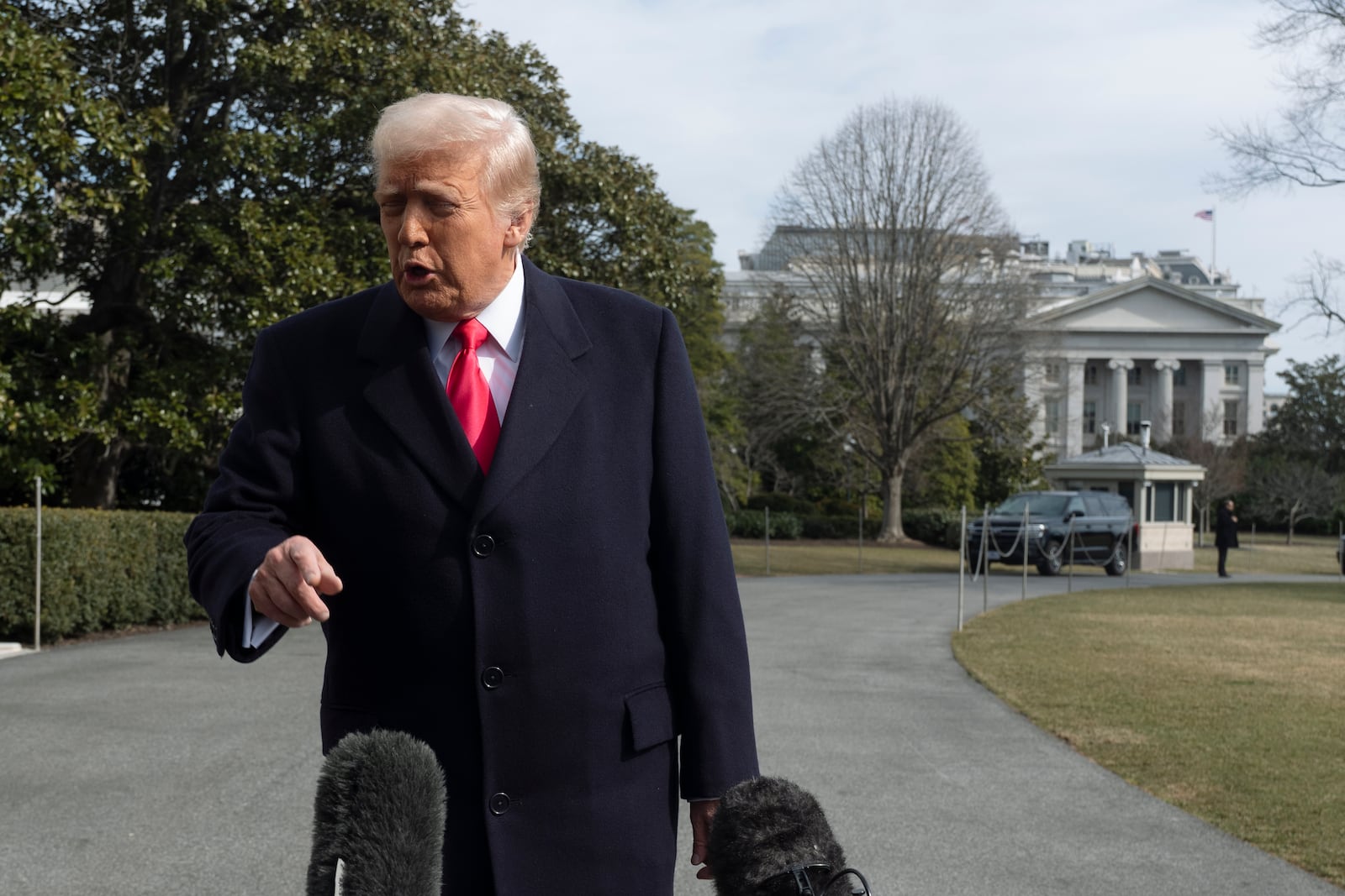 President Donald Trump speaks to reporters before leaving the White House to attend the Conservative Political Action Conference, CPAC, Saturday, Feb. 22, 2025. (AP Photo/Manuel Balce Ceneta)