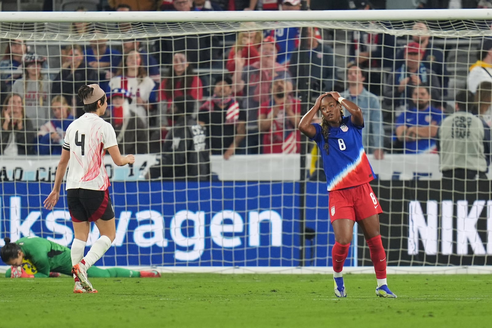 United States midfielder Jaedyn Shaw, right, reacts after a missed opportunity to score against Japan during the second half of a SheBelieves Cup women's soccer tournament match Wednesday, Feb. 26, 2025, in San Diego. (AP Photo/Gregory Bull)