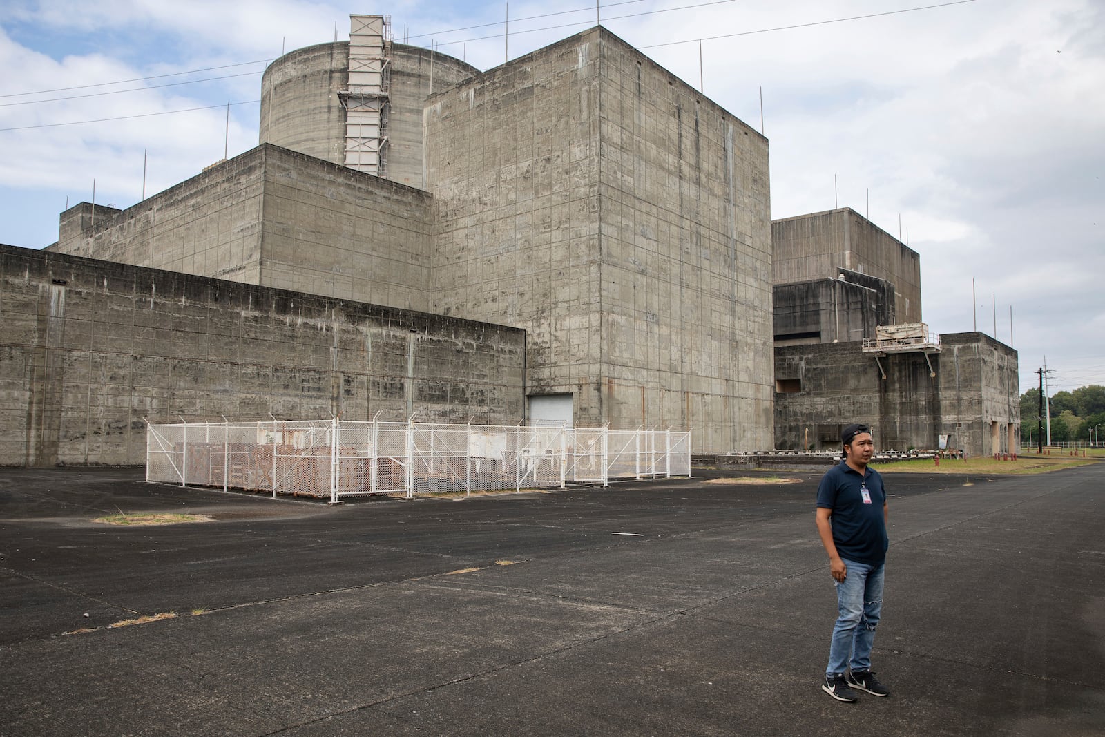 An equipment control operator with the Philippine National Power Corporation explains the purpose of each building during a tour of the Bataan Nuclear Power Plant on Monday, Jan. 20, 2025. (AP Photo/Anton L. Delgado)