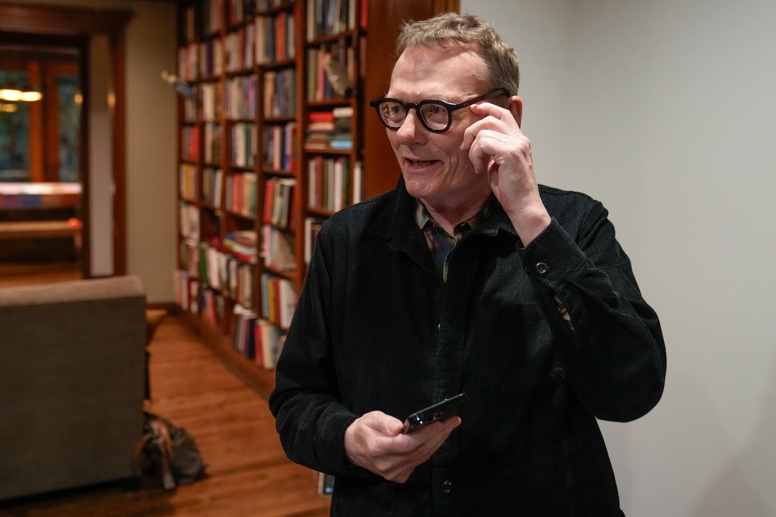 Nobel prize winner in Economics, James A. Robinson, gives an interview to the Associated Press from his home in the Hyde Park neighborhood of Chicago, Monday, Oct. 14, 2024. (AP Photo/Charles Rex Arbogast)