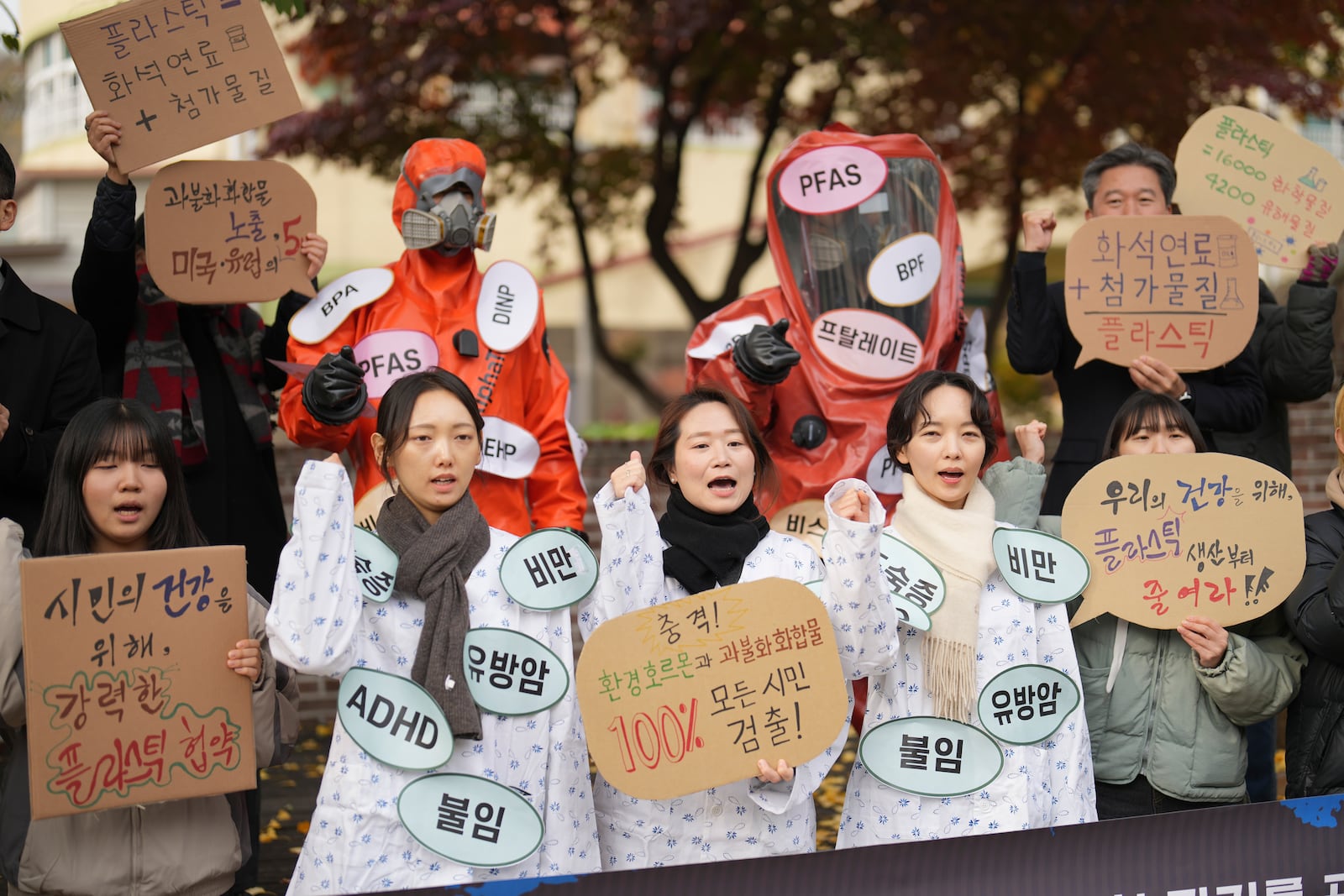 Environment activists shout slogans during a rally calling for a strong global plastics treaty ahead of the fifth session of the Intergovernmental Negotiating Committee on Plastic Pollution which sets to be held in Busan from Nov. 25 to Dec. 1, in Seoul, South Korea, Wednesday, Nov. 20, 2024. (AP Photo/Lee Jin-man)