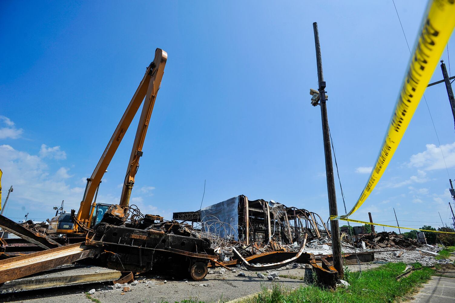 Crews demolish warehouse after massive fire in Hamilton