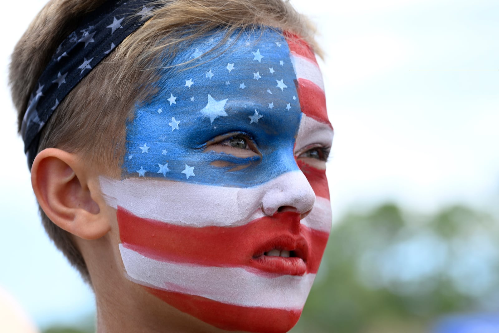 Jackson Taylor, 9, of St. Augustine, Fla., looks on during the Florida Man Games, Saturday, March 1, 2025, in Elkton, Fla. (AP Photo/Phelan M. Ebenhack)