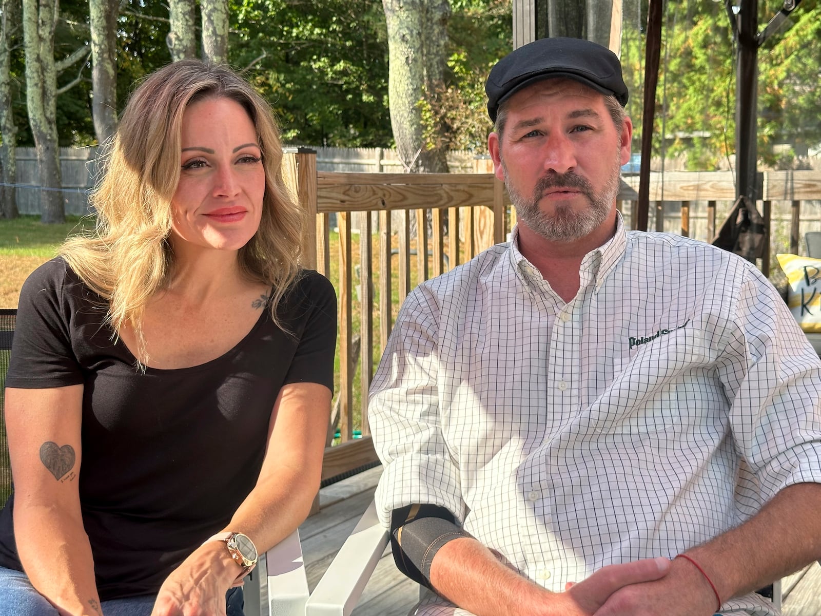 Lewiston mass shooting survivor Ben Dyer and fiancée Keela Smith show Dyer's injuries from the 2023 massacre and talk about their plans for the future on Wednesday, Oct. 3, 2024 in Auburn, Maine. (AP Photo/Nick Perry)