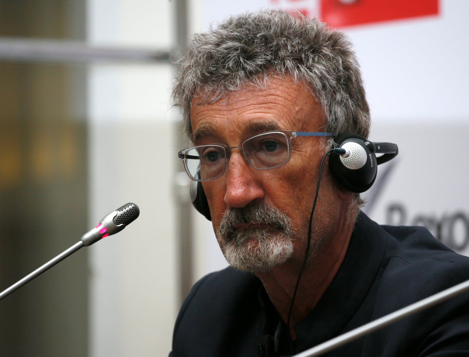 FILE - Eddie Jordan, former Formula One driver and team owner, listens during a press conference during a Moscow City Racing 2013 along the Moscow Kremlin, in Moscow, Russia, Sunday, July 21, 2013. (AP Photo/ Alexander Zemlianichenko Jr, File)