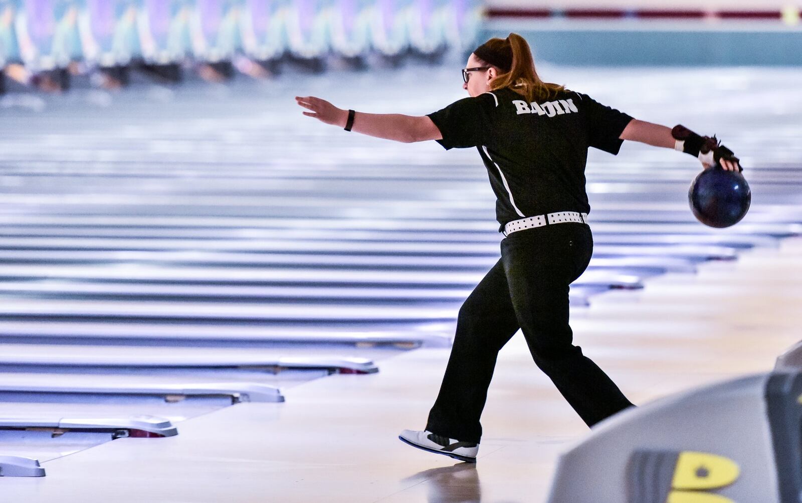 Badin’s Stephanie O’Neil delivers a shot during Thursday’s Division II district bowling tournament at Beaver-Vu Bowl in Beavercreek. NICK GRAHAM/STAFF