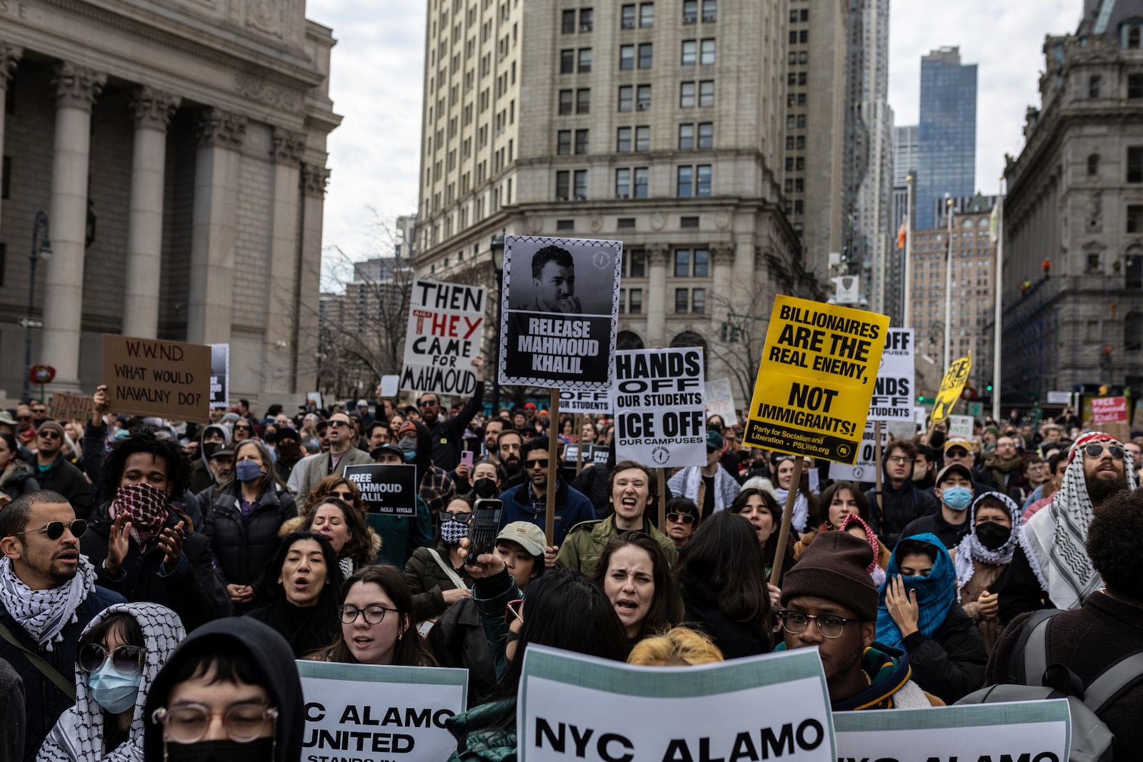 A crowd gathers in Foley Square, outside the Manhattan federal court, in support of Mahmoud Khalil, Wednesday, March 12, 2025, in New York. (AP Photo/Stefan Jeremiah)