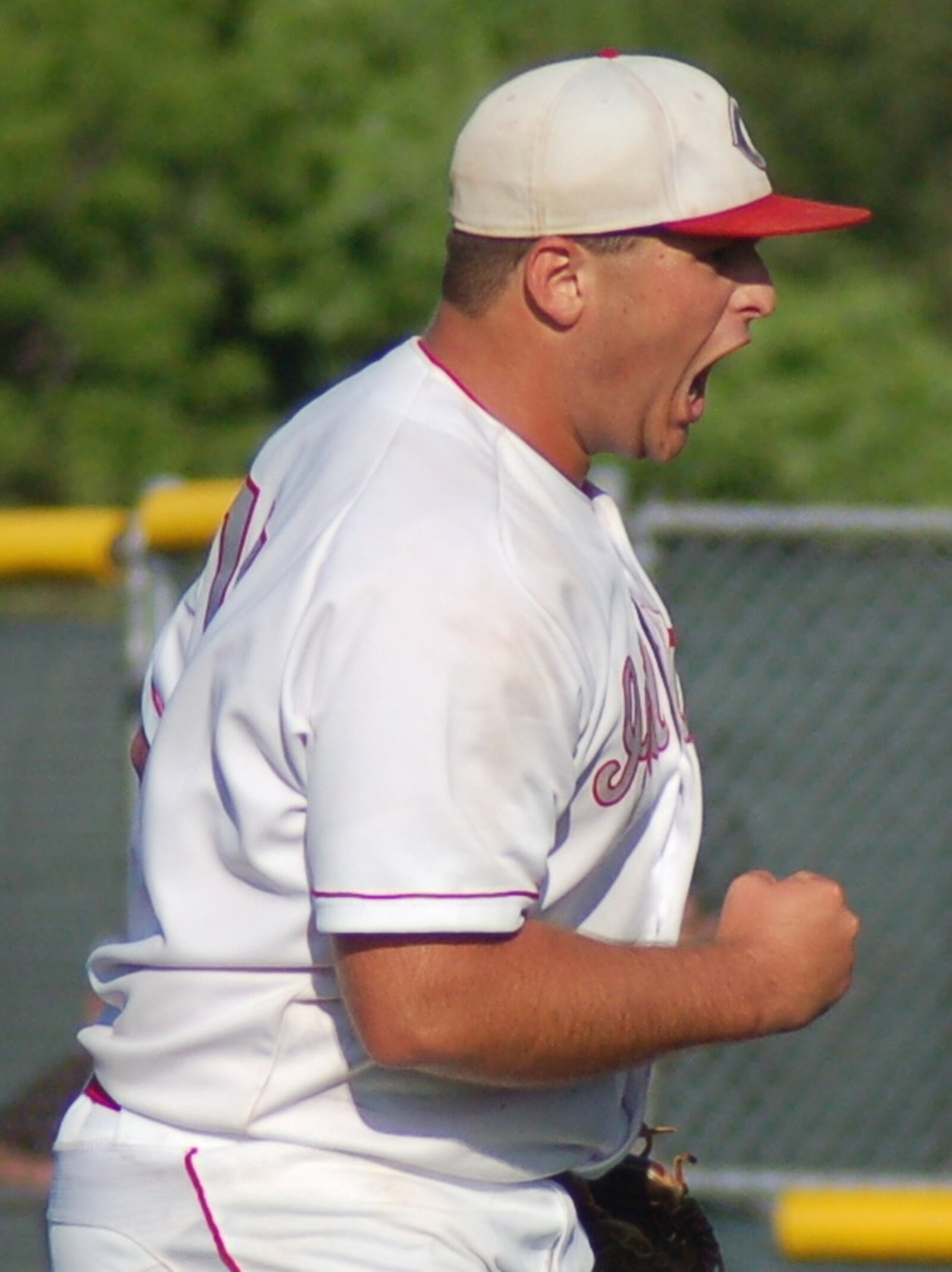 Carlisle pitcher Jake Glover shows his emotions during Friday’s Division III regional final against Cincinnati Hills Christian Academy at the Athletes in Action complex in Xenia. CONTRIBUTED PHOTO BY JOHN CUMMINGS