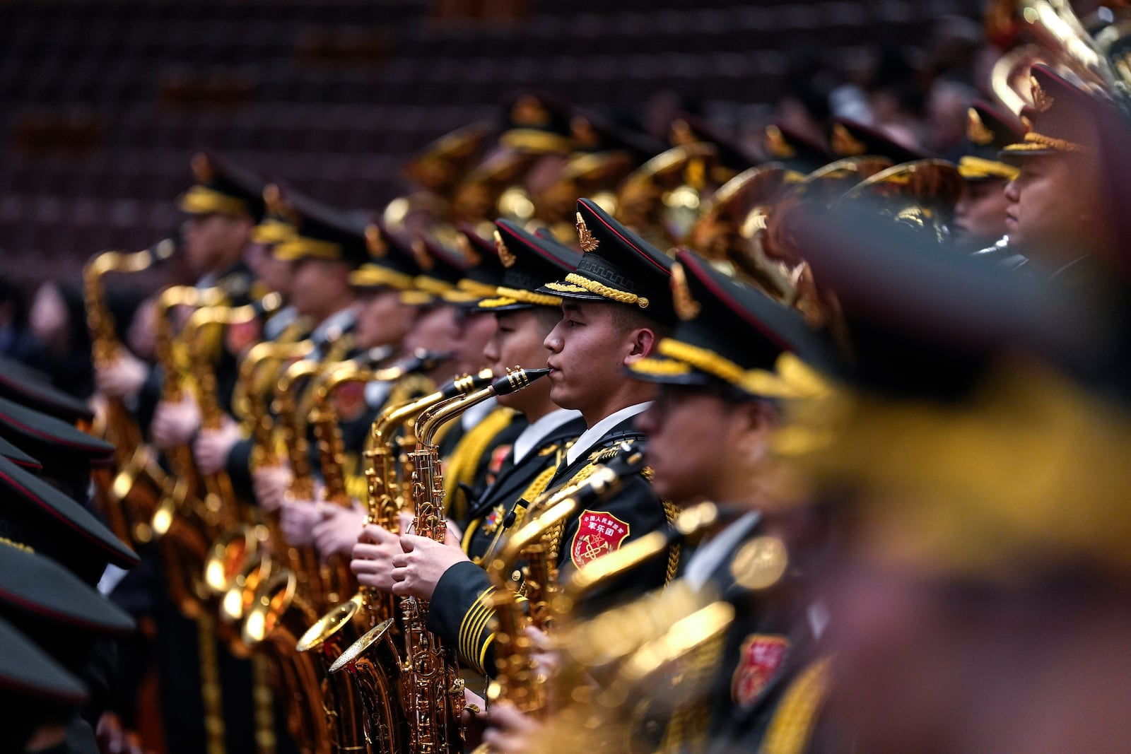 A Chinese military band performs at the closing ceremony of the National People's Congress held at the Great Hall of the People in Beijing, Tuesday, March 11, 2025. (AP Photo/Ng Han Guan)