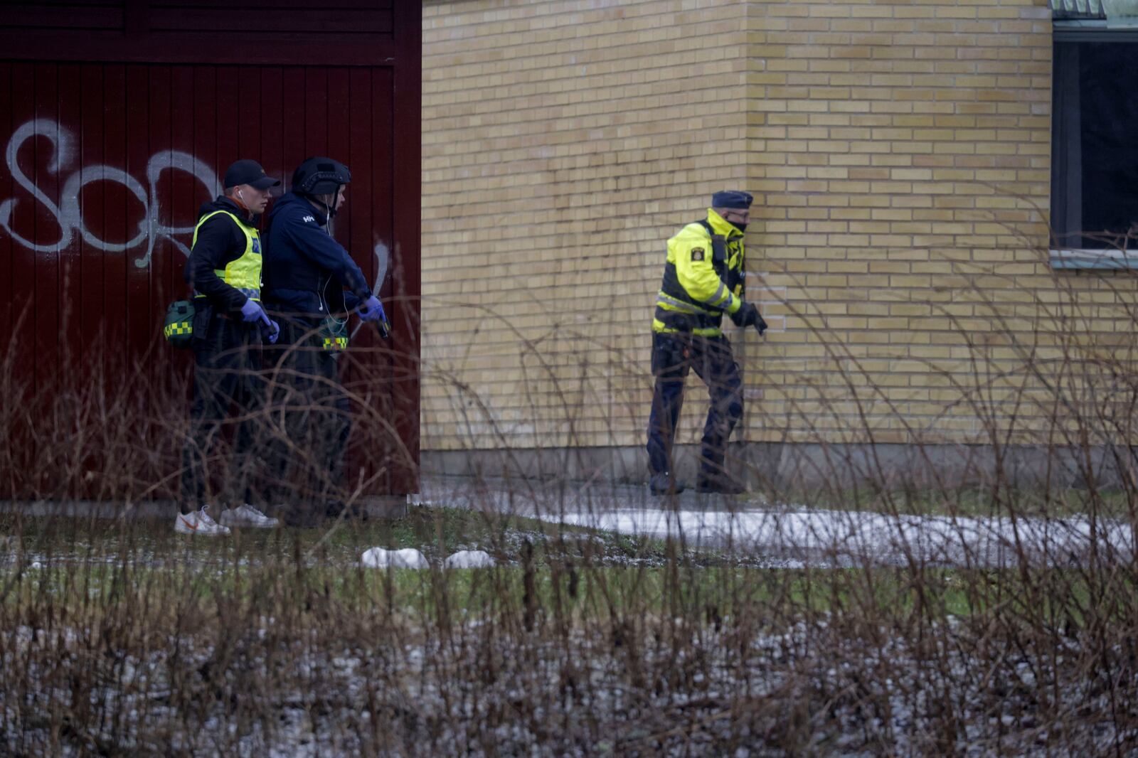 Police at the scene of an incident at Risbergska School, in Örebro, Sweden, Tuesday, Feb. 4, 2025. (Kicki Nilsson/TT News Agency via AP)