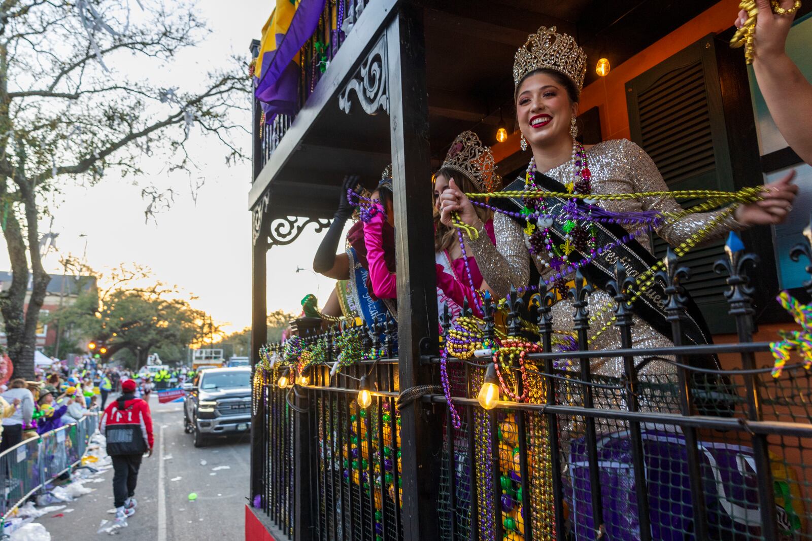 Louisiana festival queens from across the state ride in a float during the Krewe of Bacchus parade in New Orleans, Sunday, March 2, 2025. (Chris Granger/The Times-Picayune/The New Orleans Advocate via AP)