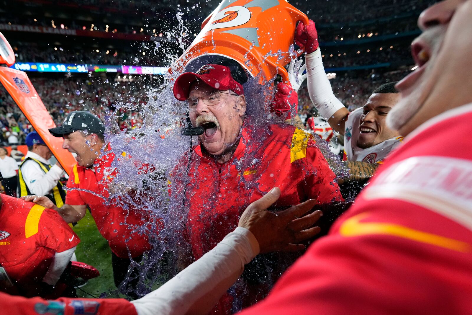 FILE_ Kansas City Chiefs head coach Andy Reid is doused after their win against the Philadelphia Eagles at the NFL Super Bowl 57 football game, Sunday, Feb. 12, 2023, in Glendale, Ariz. (AP Photo/Matt Slocum, File)