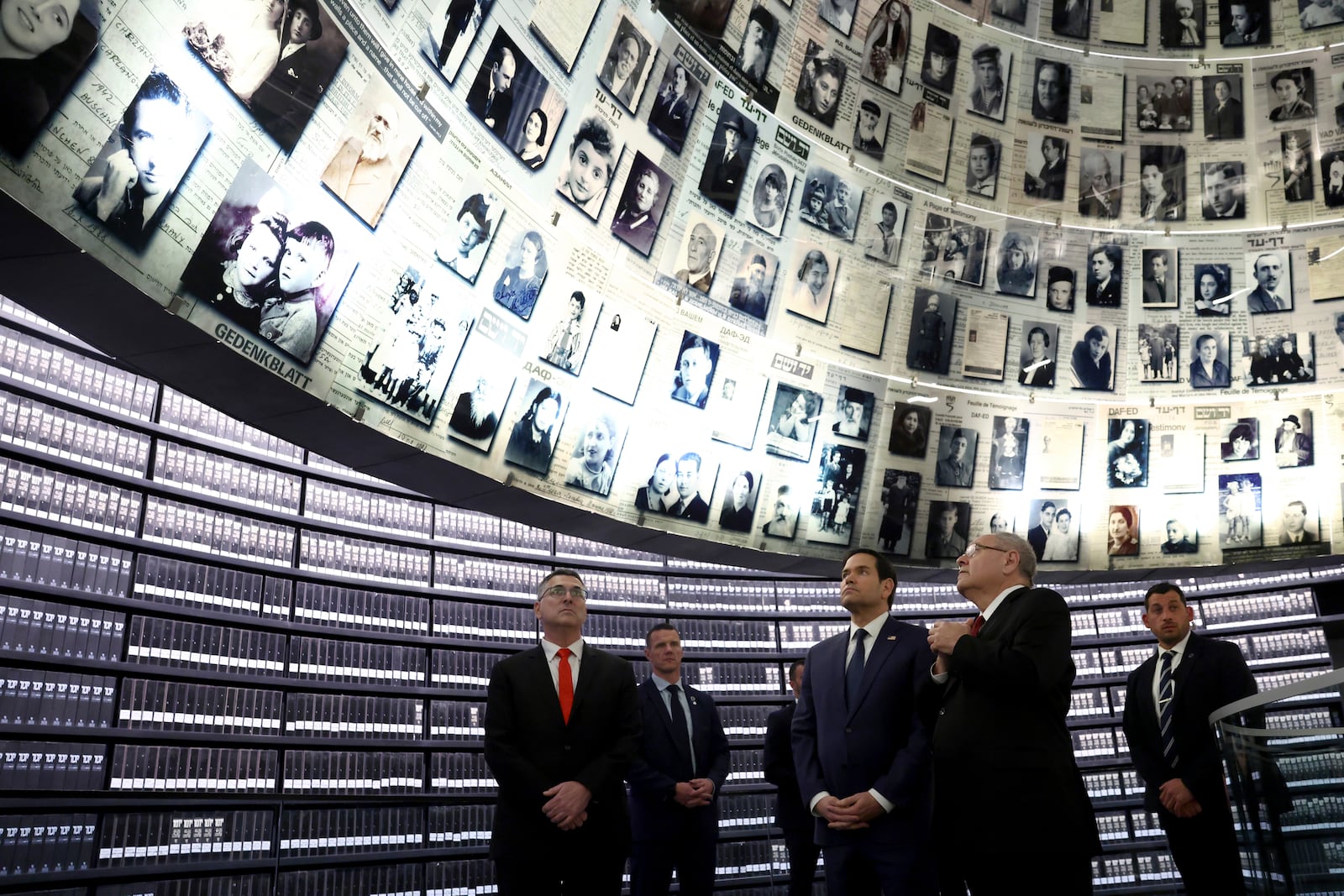 U.S. Secretary of State Marco Rubio, front center, accompanied by Chairman of Yad Vashem Dani Dayan, front right, and Israel's Foreign Minister Gideon Sa'ar, left, tours Yad Vashem, the World Holocaust Remembrance Center, in Jerusalem, Israel, Sunday Feb. 16, 2025. (Evelyn Hockstein, Pool Photo via AP)