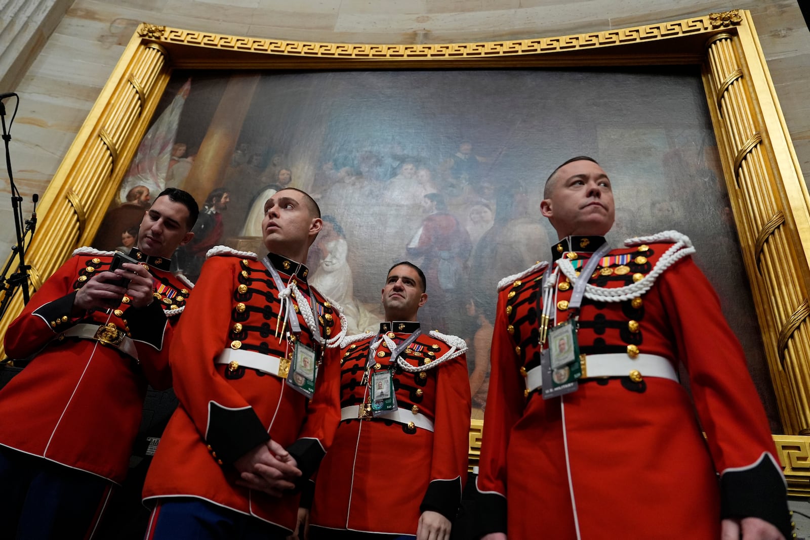 Members of the the U.S. Marine Band, "The President's Own," arrive before the 60th Presidential Inauguration in the Rotunda of the U.S. Capitol in Washington, Monday, Jan. 20, 2025. (AP Photo/Julia Demaree Nikhinson, Pool)