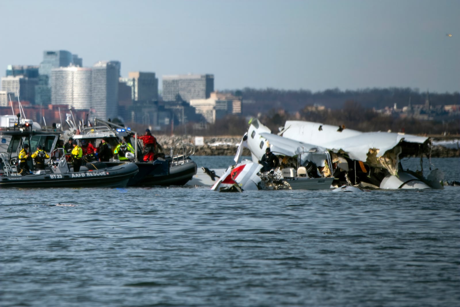 In this image provided by the U.S. Coast Guard, wreckage is seen in the Potomac River near Ronald Reagan Washington National Airport, Thursday, Jan. 30, 2025 in Washington. (Petty Officer 2nd Class Taylor Bacon, U.S. Coast Guard via AP)