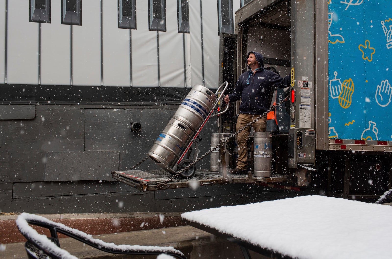 Jonathan Walker delivers kegs of beer to businesses as a winter snowstorm hits Charlottesville, Va., Tuesday, Feb. 11, 2025. (Cal Cary/The Daily Progress via AP)