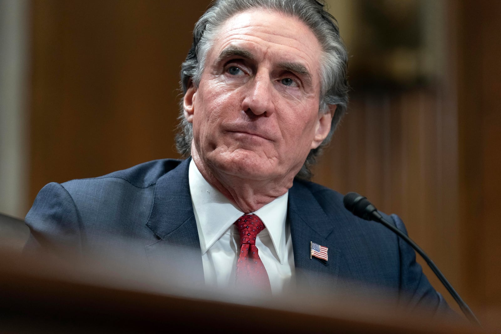 Former Gov. Doug Burgum, President-elect Donald Trump's choice to lead the the Interior Department as Secretary of the Interior, testifies before the Senate Energy and Natural Resources Committee on Capitol Hill in Washington, Thursday, Jan. 16, 2025. (AP Photo/Jose Luis Magana)