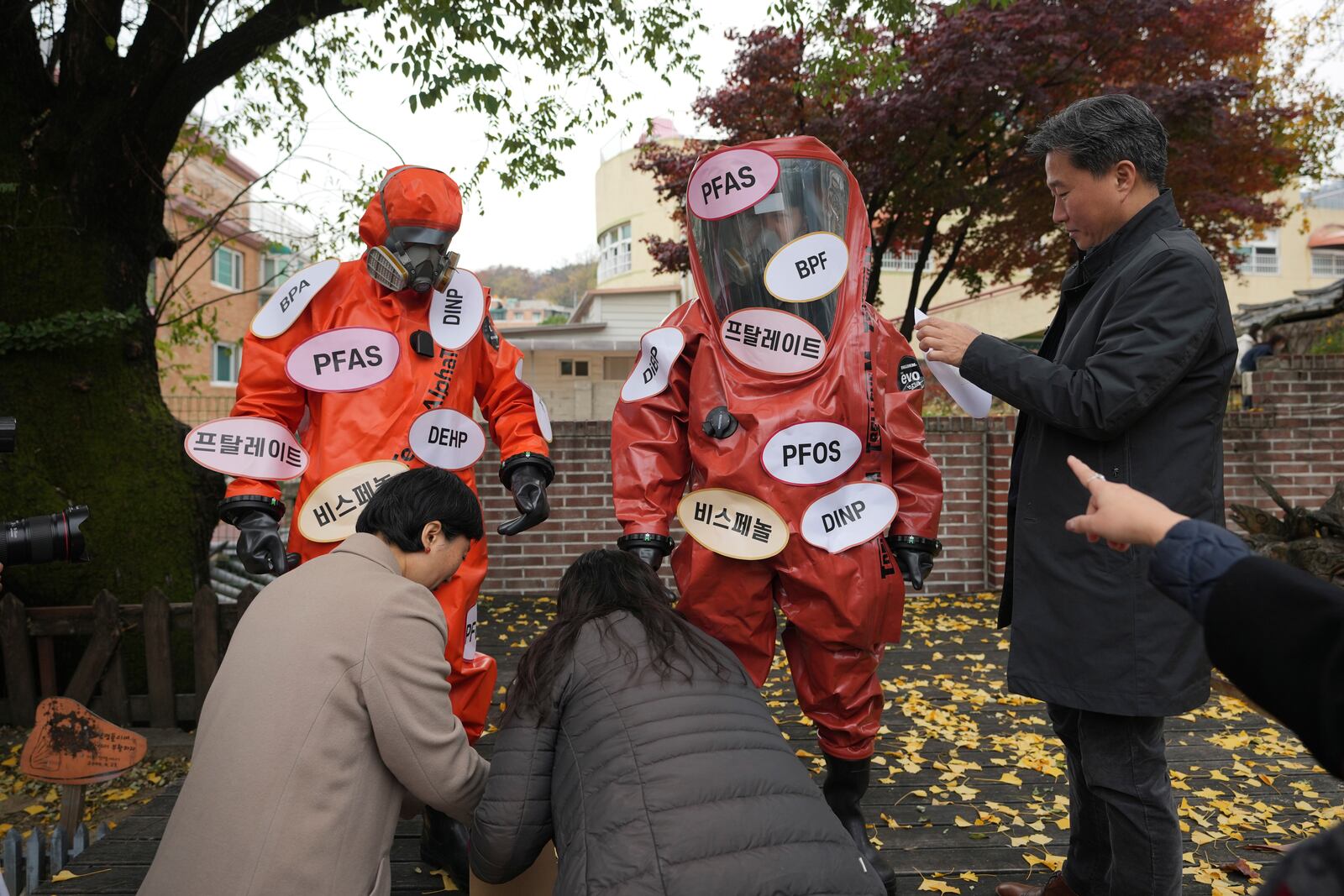 Environment activists prepare for a rally calling for a strong global plastics treaty ahead of the fifth session of the Intergovernmental Negotiating Committee on Plastic Pollution which sets to be held in Busan from Nov. 25 to Dec. 1, in Seoul, South Korea, Wednesday, Nov. 20, 2024. (AP Photo/Lee Jin-man)