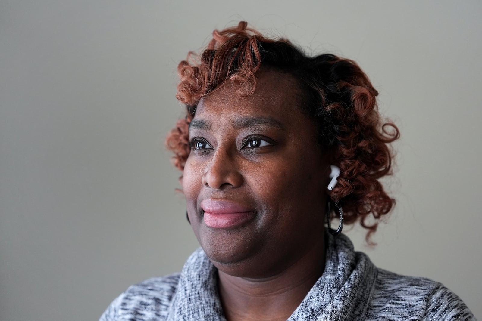 DarNisha Hardaway poses at home in Detroit, Monday, Feb. 17, 2025. (AP Photo/Paul Sancya)