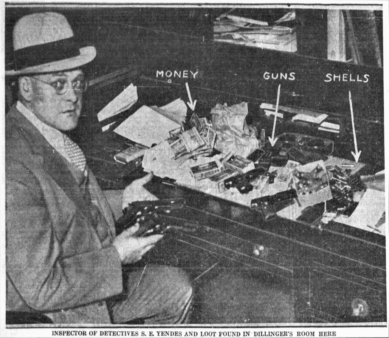 Inspector of detectives S. E. Yendes and items found in John Dillinger's boarding house room during his Dayton arrest. DAYTON DAILY NEWS ARCHIVES