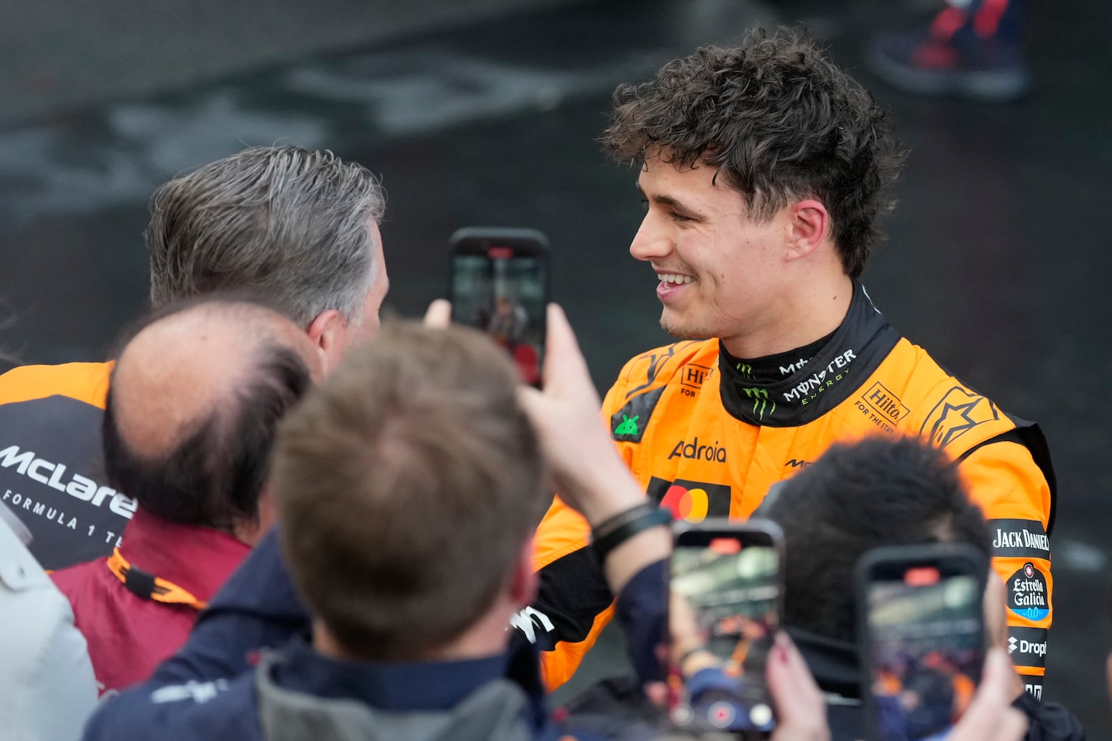 McLaren driver Lando Norris of Britain reacts after winning the Australian Formula One Grand Prix at Albert Park, in Melbourne, Australia, Sunday, March 16, 2025. (AP Photo/Asanka Brendon Ratnayake)